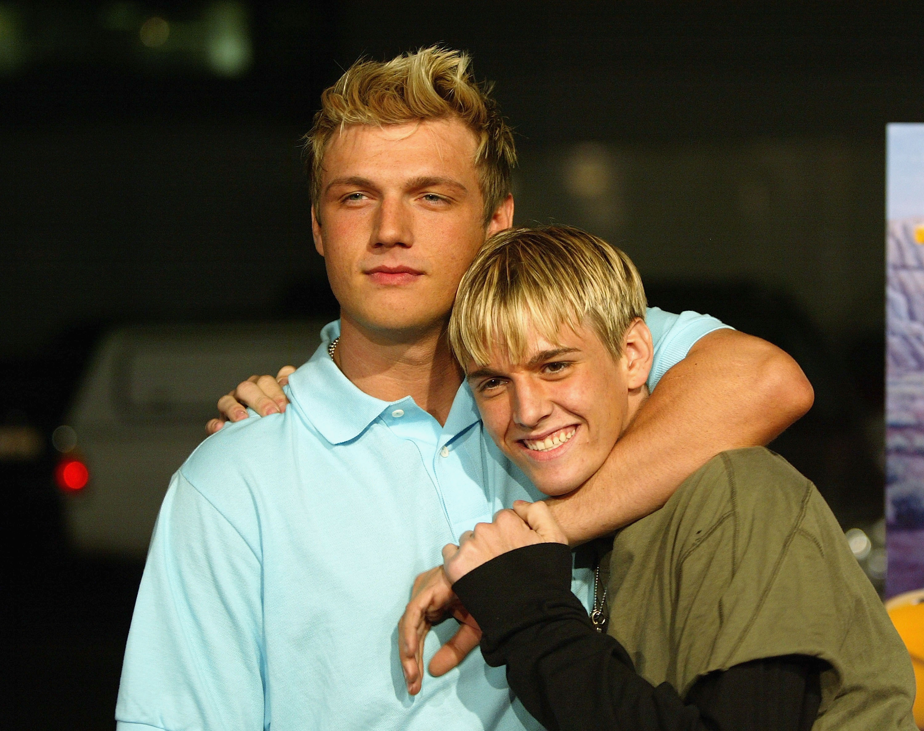 Aaron and Nick Carter arrive for the "Simple Life 2" Welcome Home Party at The Spider Club in Hollywood, California, on April 14, 2004. | Source: Getty Images