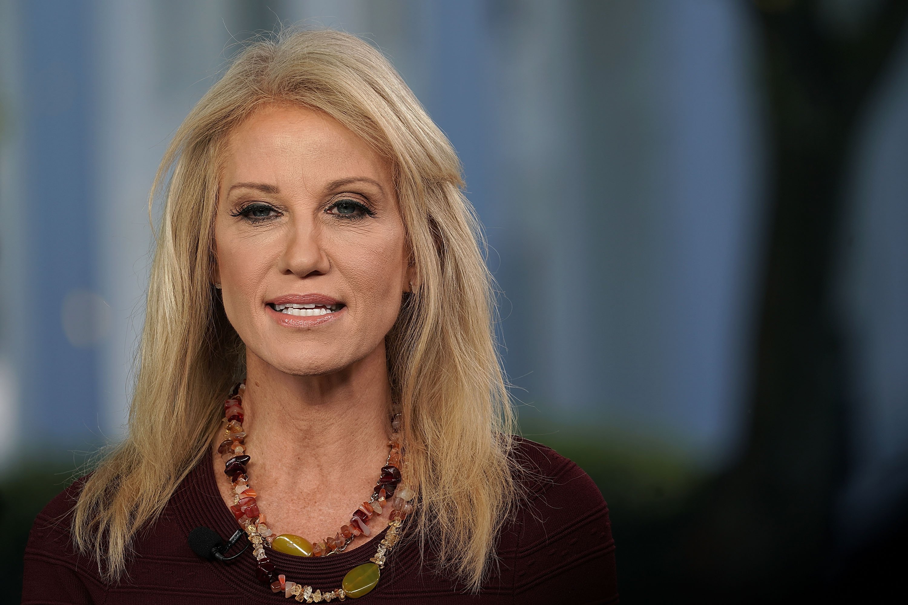 Counselor to US President Donald Trump, Kellyanne Conway, participates in a TV interview on October 3, 2018 at the White House in Washington, DC | Photo: Getty Images
