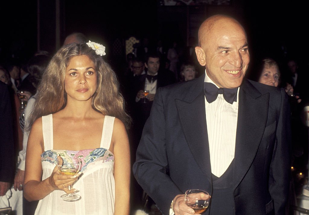 Telly Savalas with Sally Adams at The White Cliff of Dover Appeal Dinner on May 6, 1977, in Beverly Hills | Photo: Getty Images