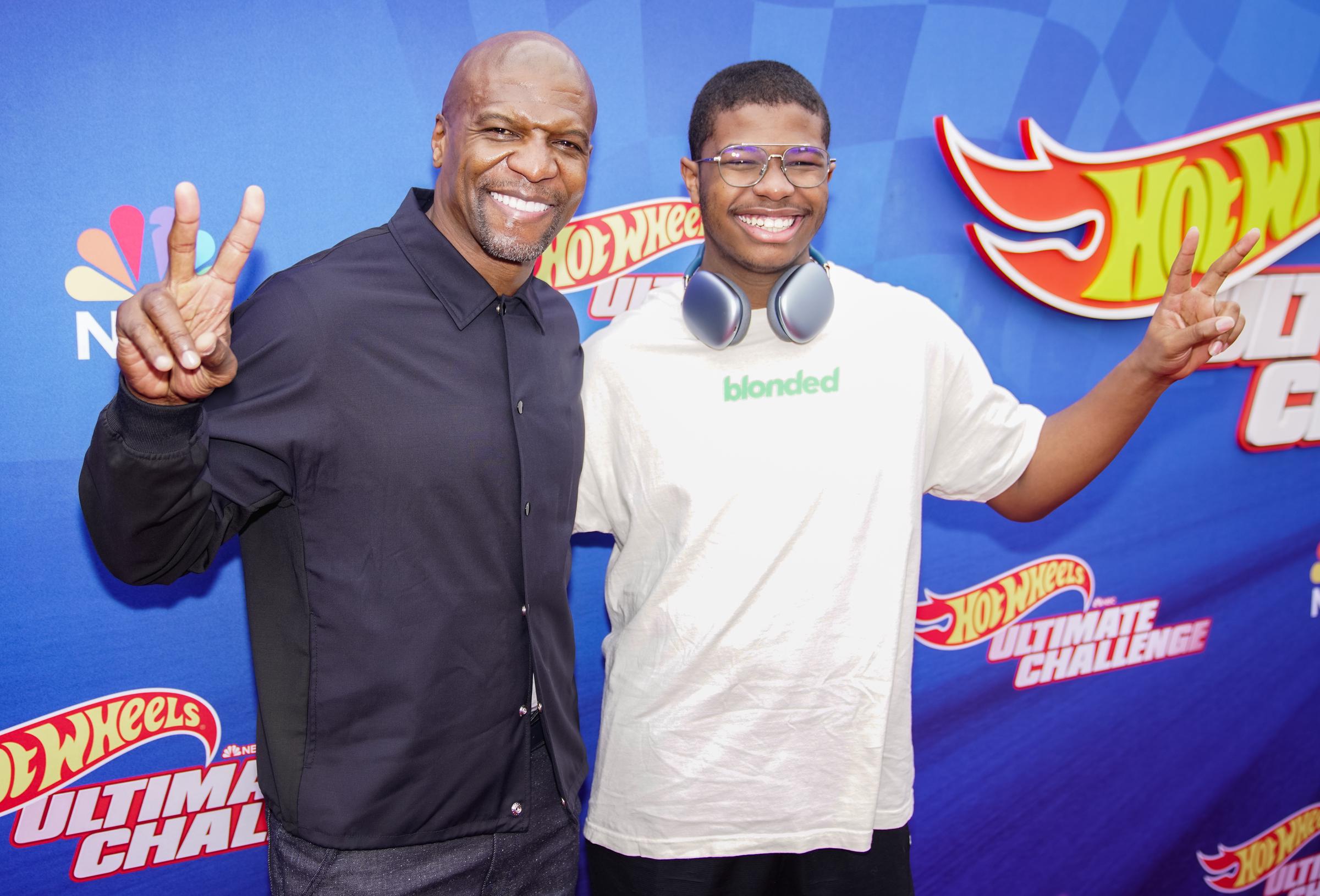 Terry and Isaiah Crews attend NBC's "Hot Wheels: Ultimate Challenge" press event on May 20, 2023 | Source: Getty Images