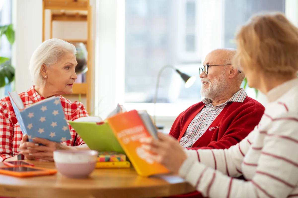 A group of adults in a book club | Source: Shutterstock