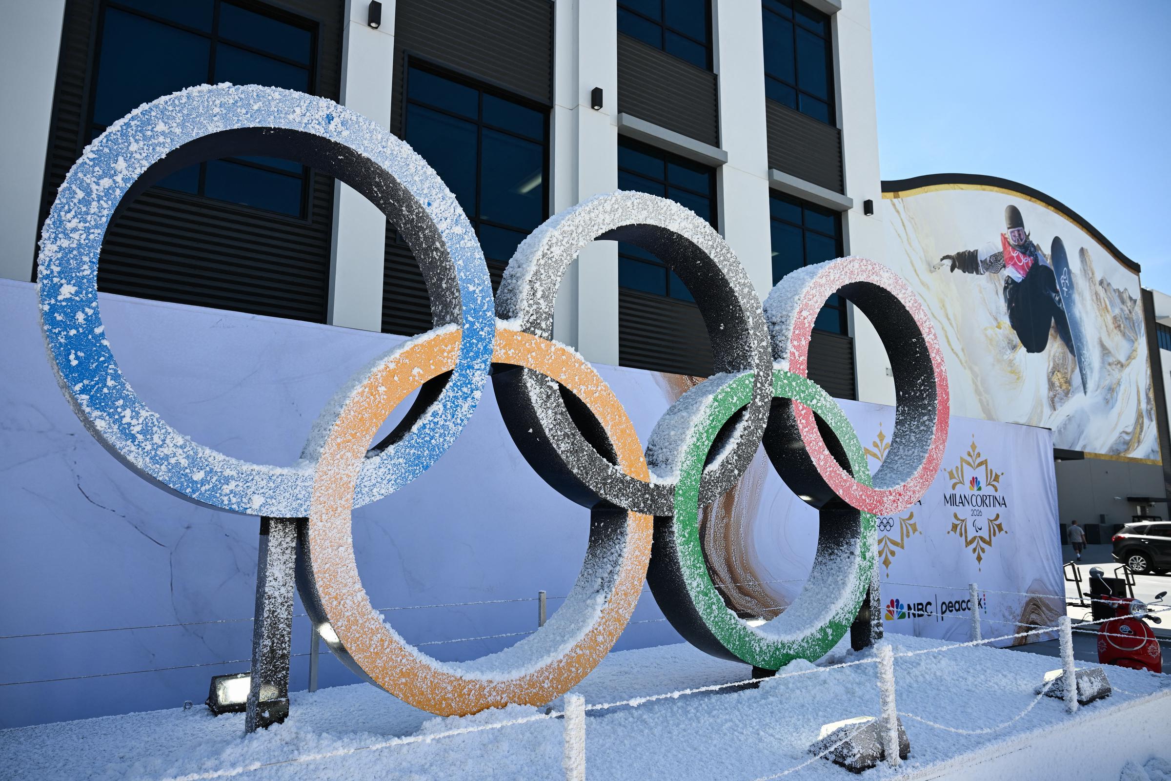 The Olympic rings are displayed outside an NBCUniversal soundstage in Los Angeles on May 21, 2025. | Source: Getty Images