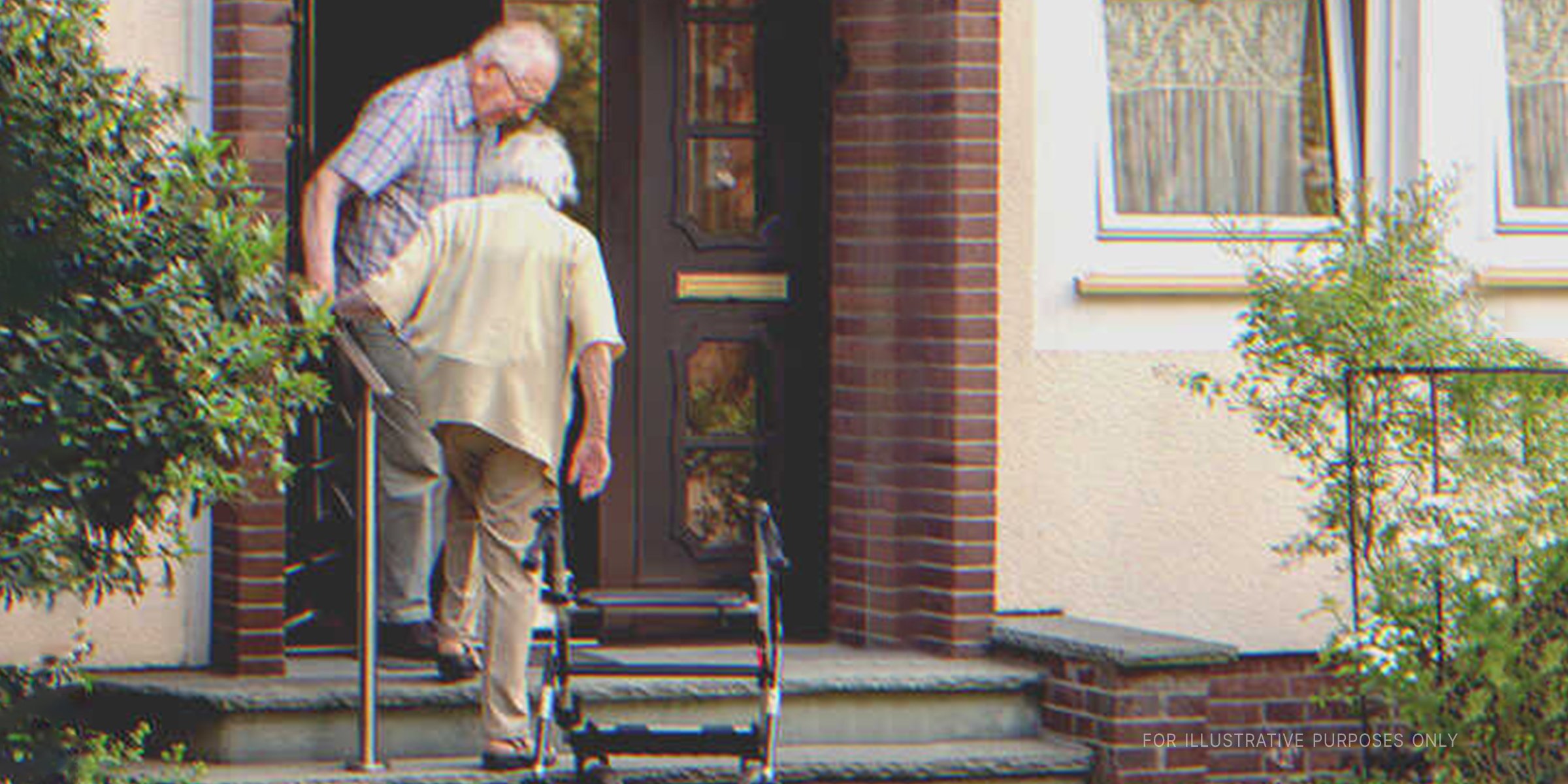 Elderly couple at doorway | Source: Shutterstock 
