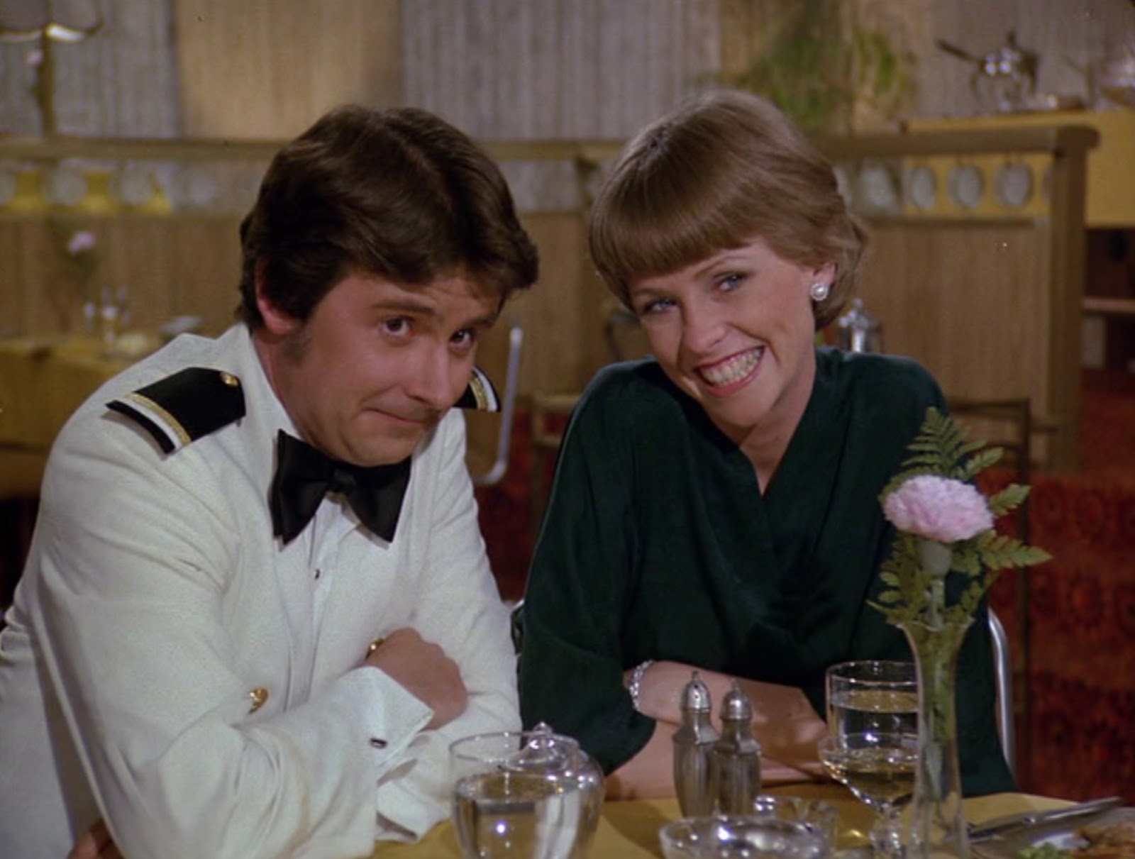 The former Hollywood star and Fred Grandy on the set of "The Love Boat," circa 1978. | Source: Getty Images