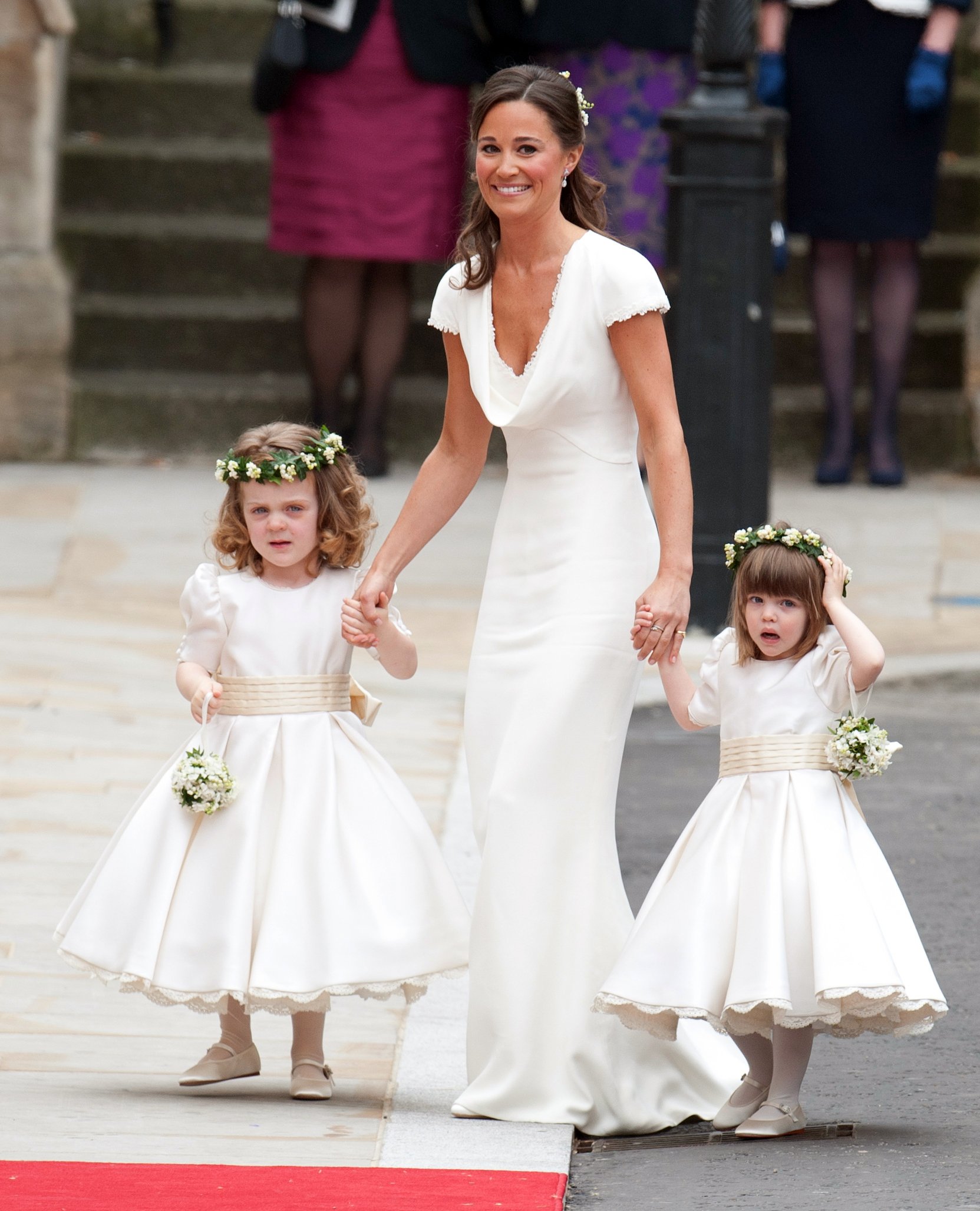 Page boys and bridesmaids arrive at Westminster Abbey escorted by Pippa Middleton before Kate Middleton and Prince William's wedding ceremony in London┃Source: Getty Images