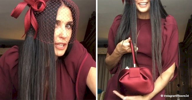 Age-defying Demi Moore turns heads in a berry dress and fascinator at the royal wedding