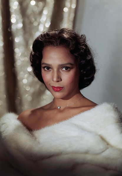 Dorothy Dandridge wearing a white fur wrap in undated publicity still | Photo: Getty Images