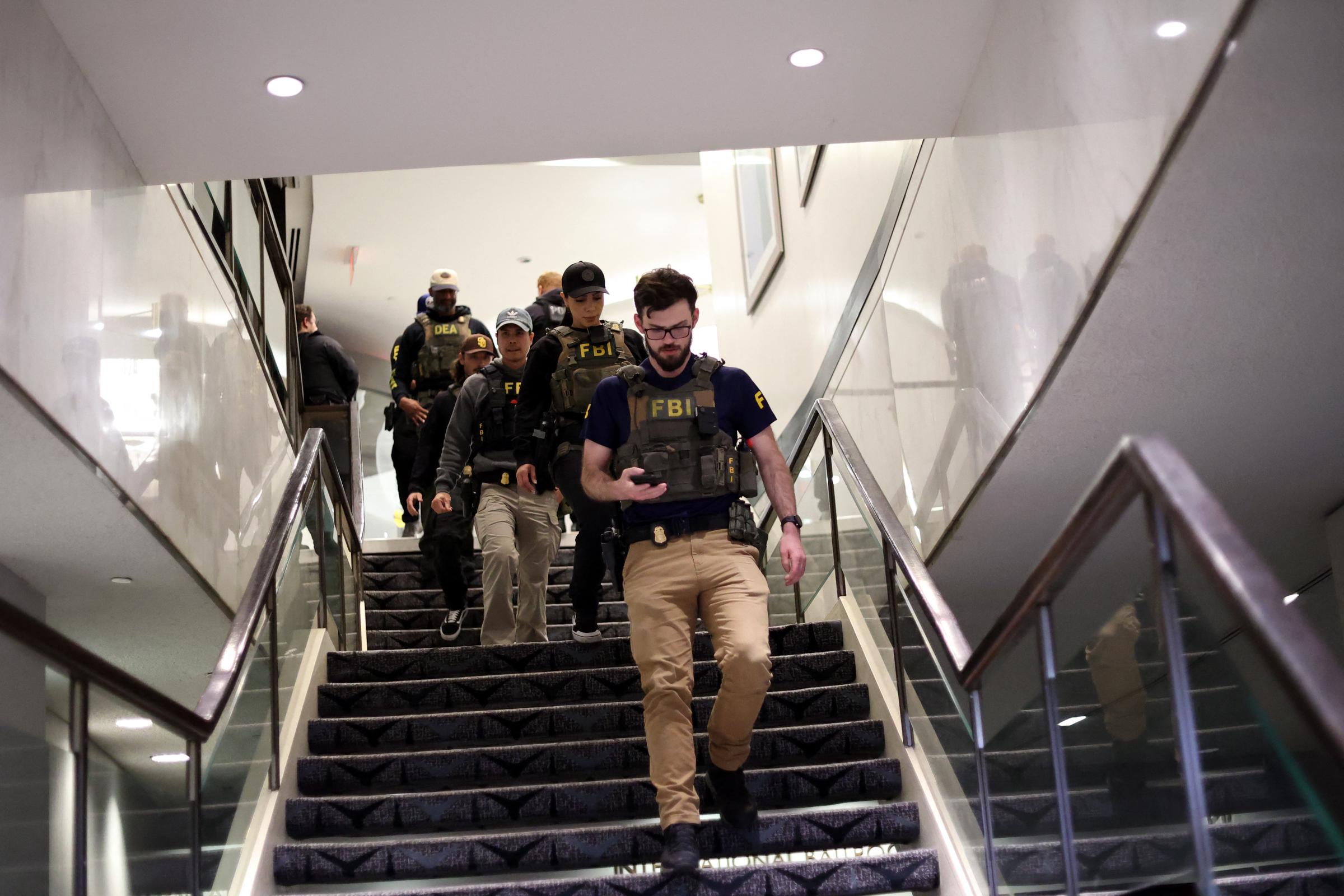 FBI agents are seen at the Washington Hilton after shots were fired during the White House Correspondents' dinner at the Washington Hilton, on April 25, 2026. | Source: Getty Images