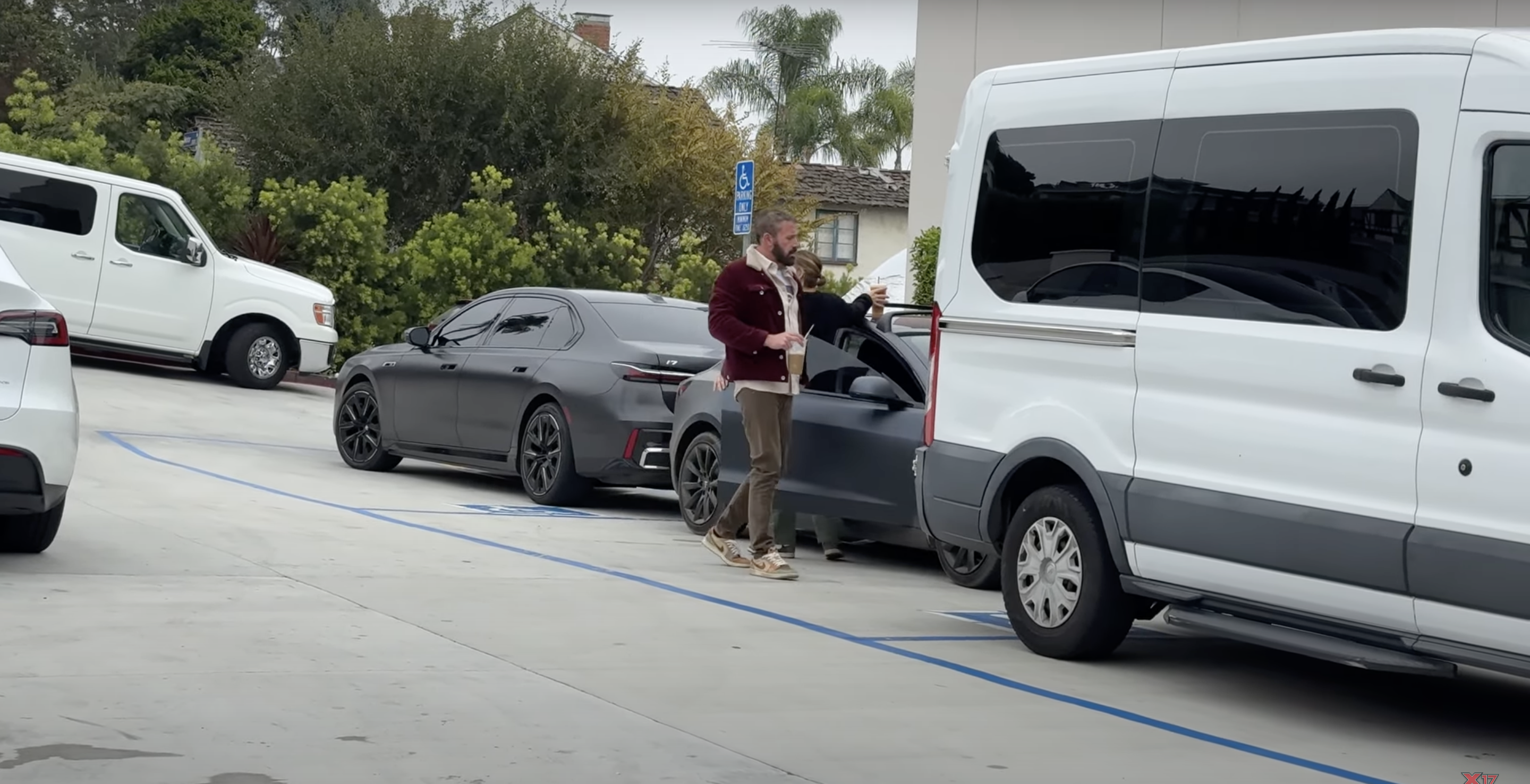 Ben Affleck arriving for work with an iced coffee in hand, from a post dated October 15, 2024 | Source: Youtube/@x17online