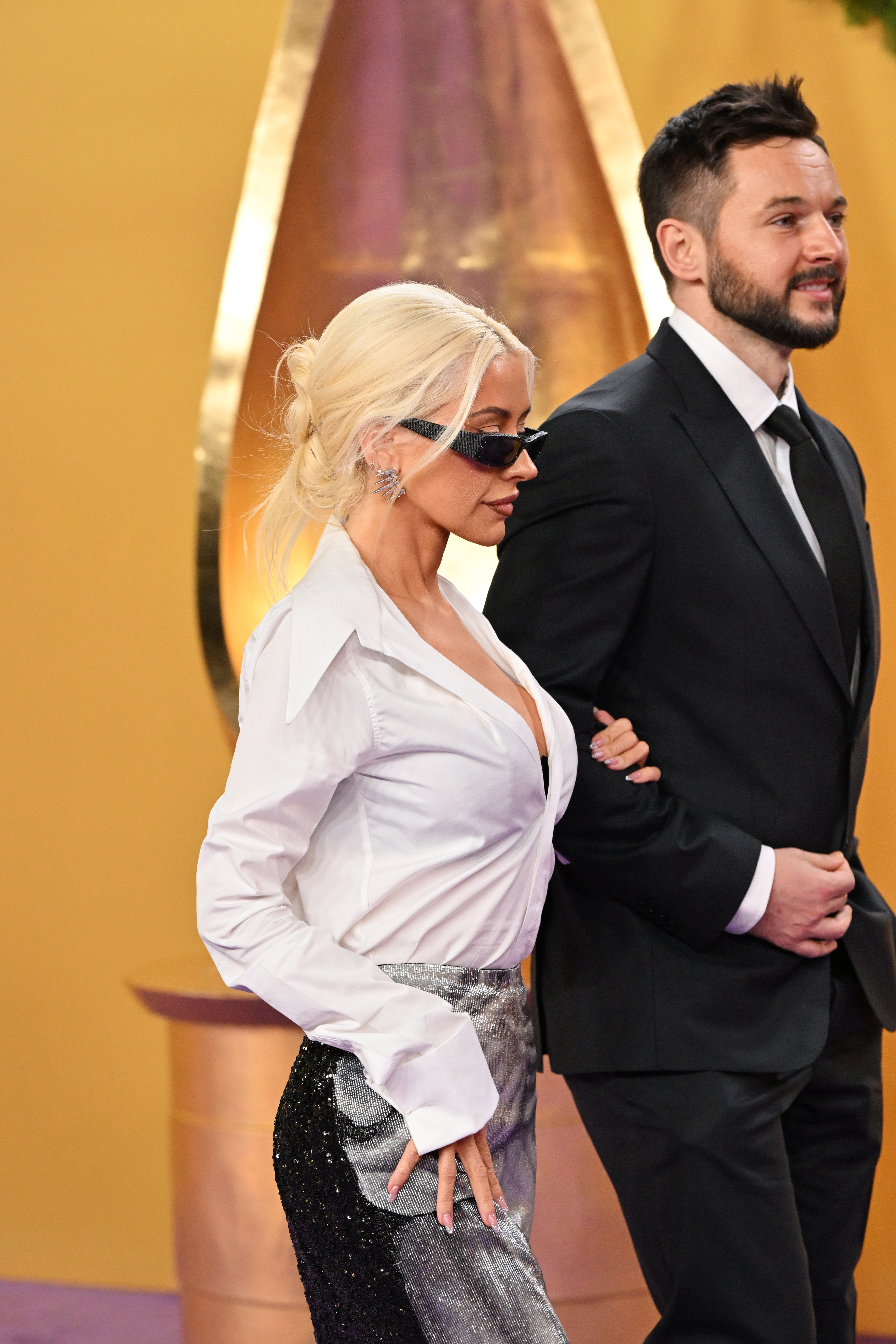 Christina Aguilera and Matthew Rutler walk on at the 2025 Joy Awards. | Source: Getty Images