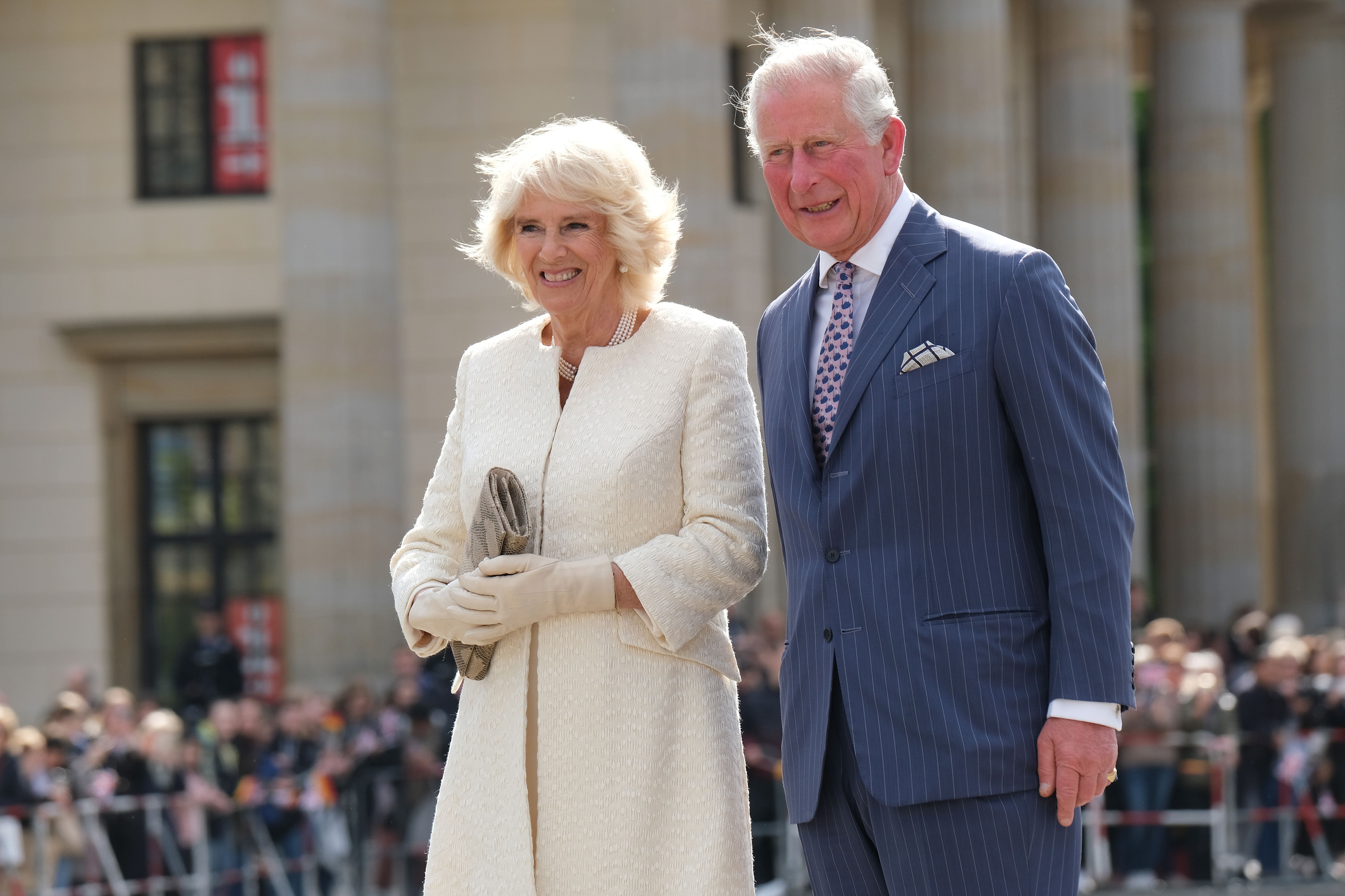 Camilla, Duchess of Cornwall and Prince Charles, Prince of Wales pause for photographers. | Source: Getty Images