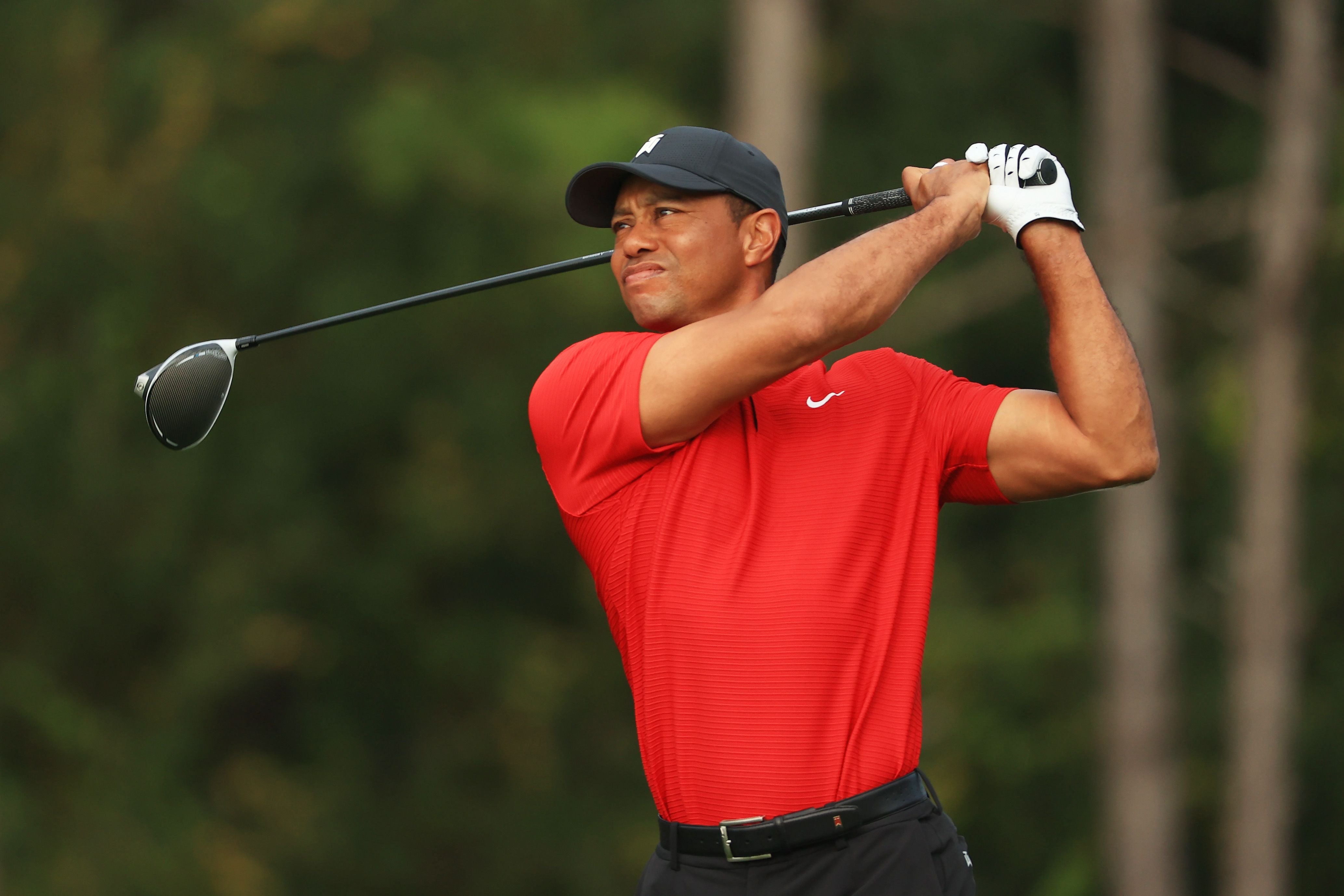  Tiger Woods plays during the final round of the PNC Championship at the Ritz-Carlton Golf Club Orlando on December 20, 2020 | Getty Images