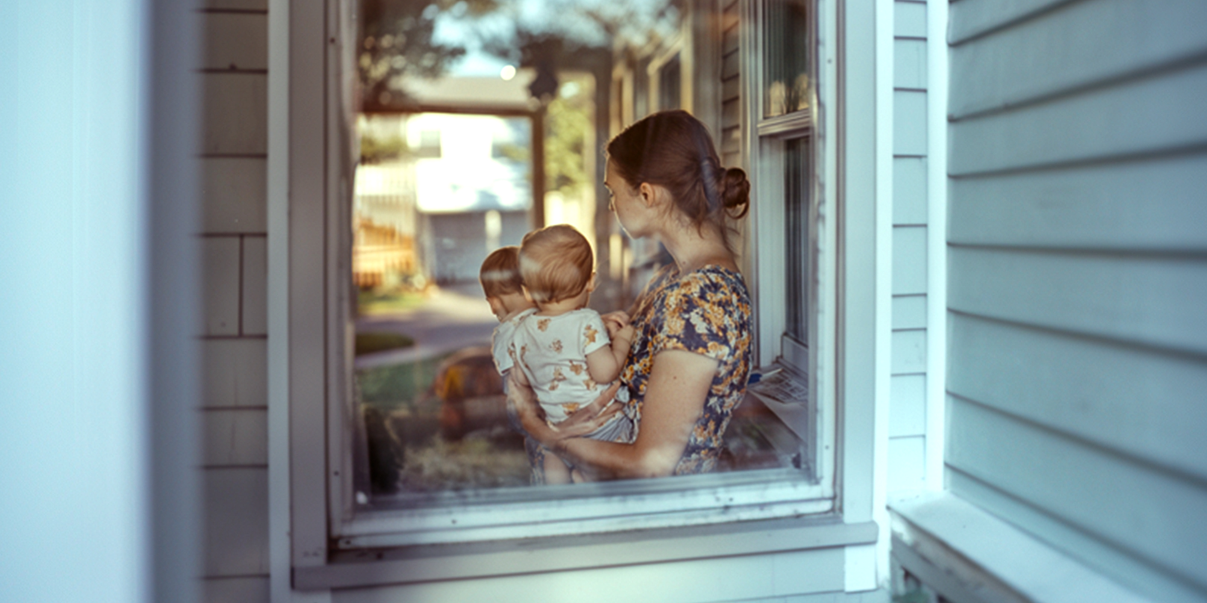 A woman holding a baby | Source: Amomama