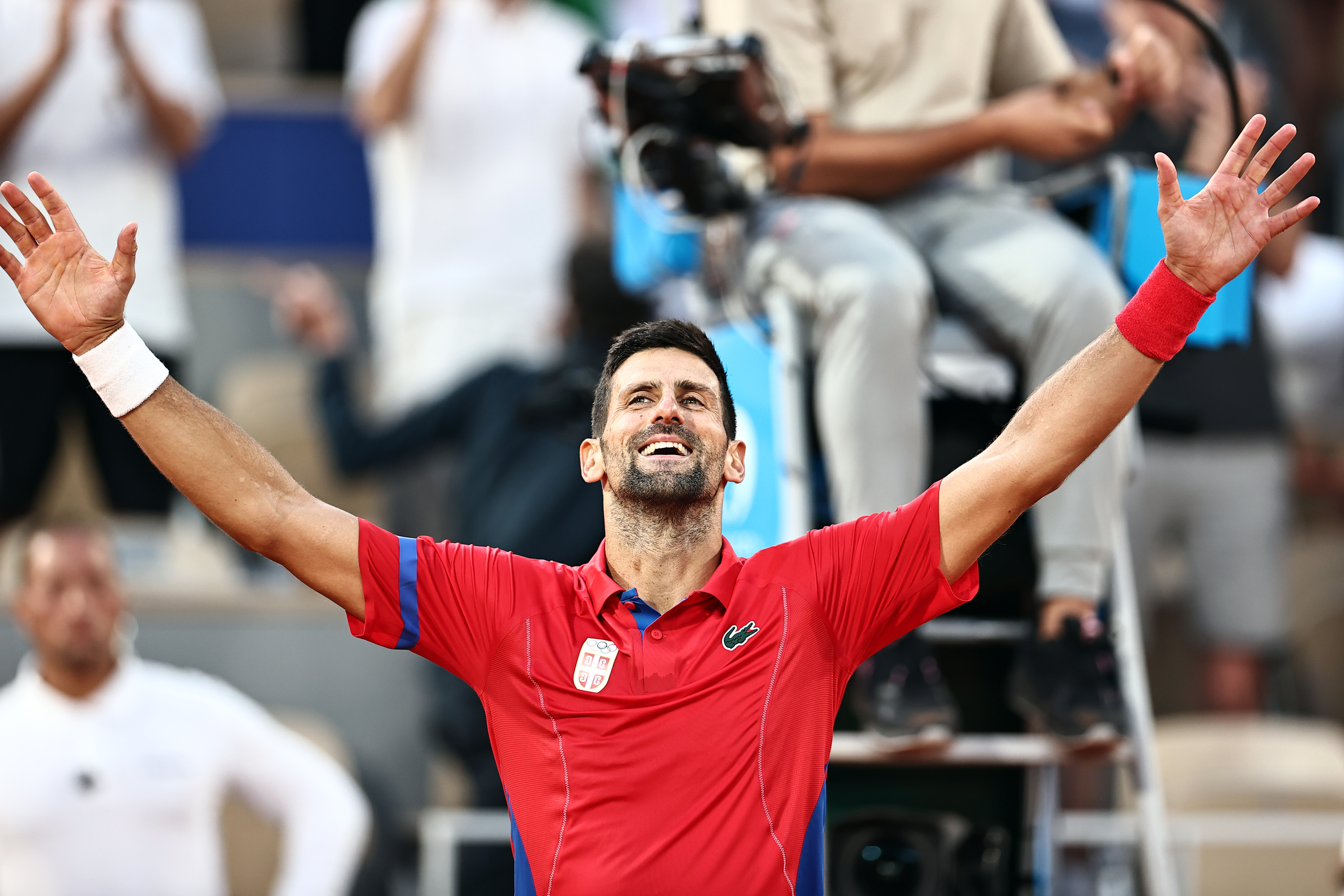 Novak Djokovic celebrates after winning against Carlos Alcaraz on August 4, 2024 | Source: Getty Images