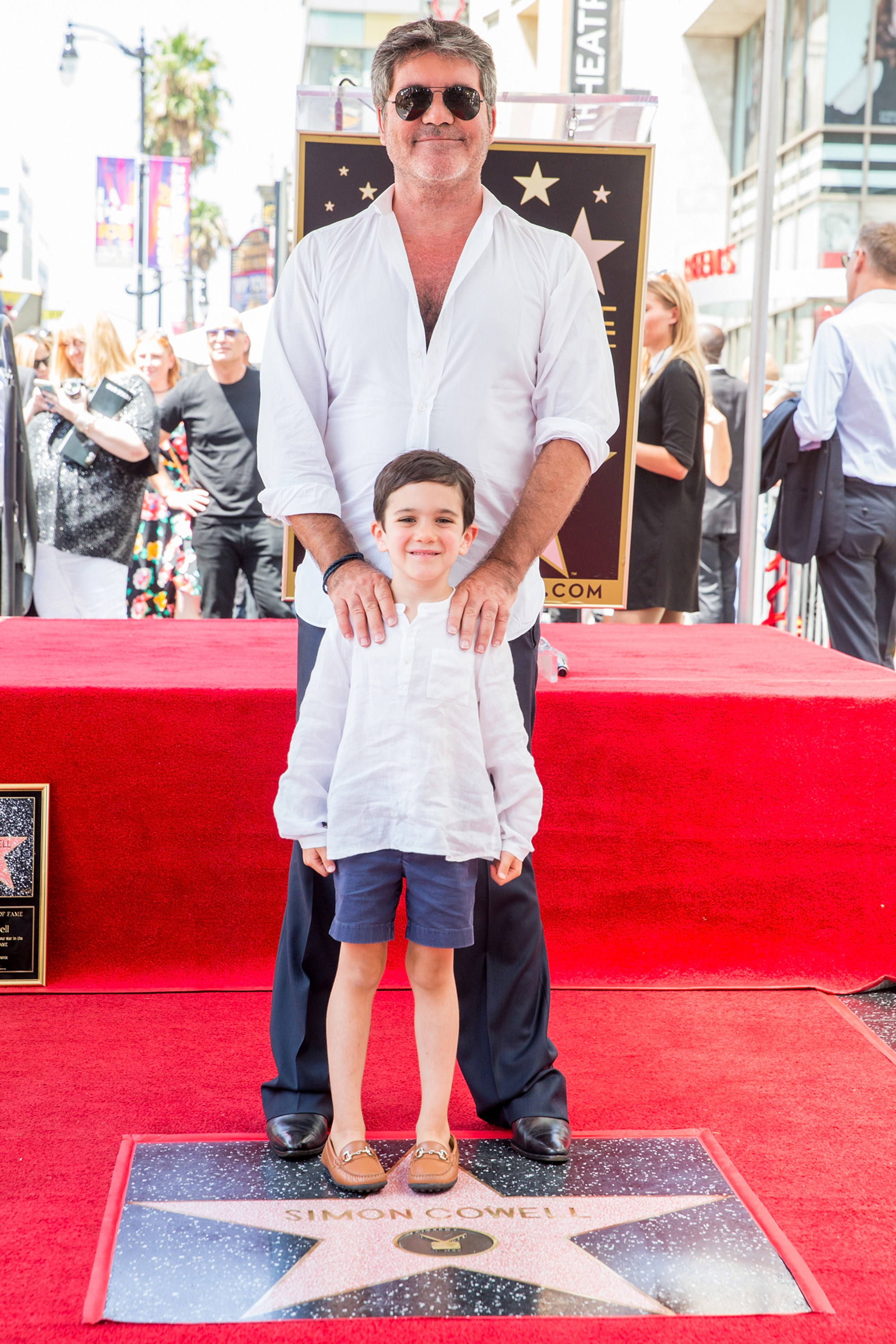 Simon and Eric Cowell at Simon's Star on the Hollywood Walk of Fame ceremony on August 22, 2018, in California. | Source: Getty Images