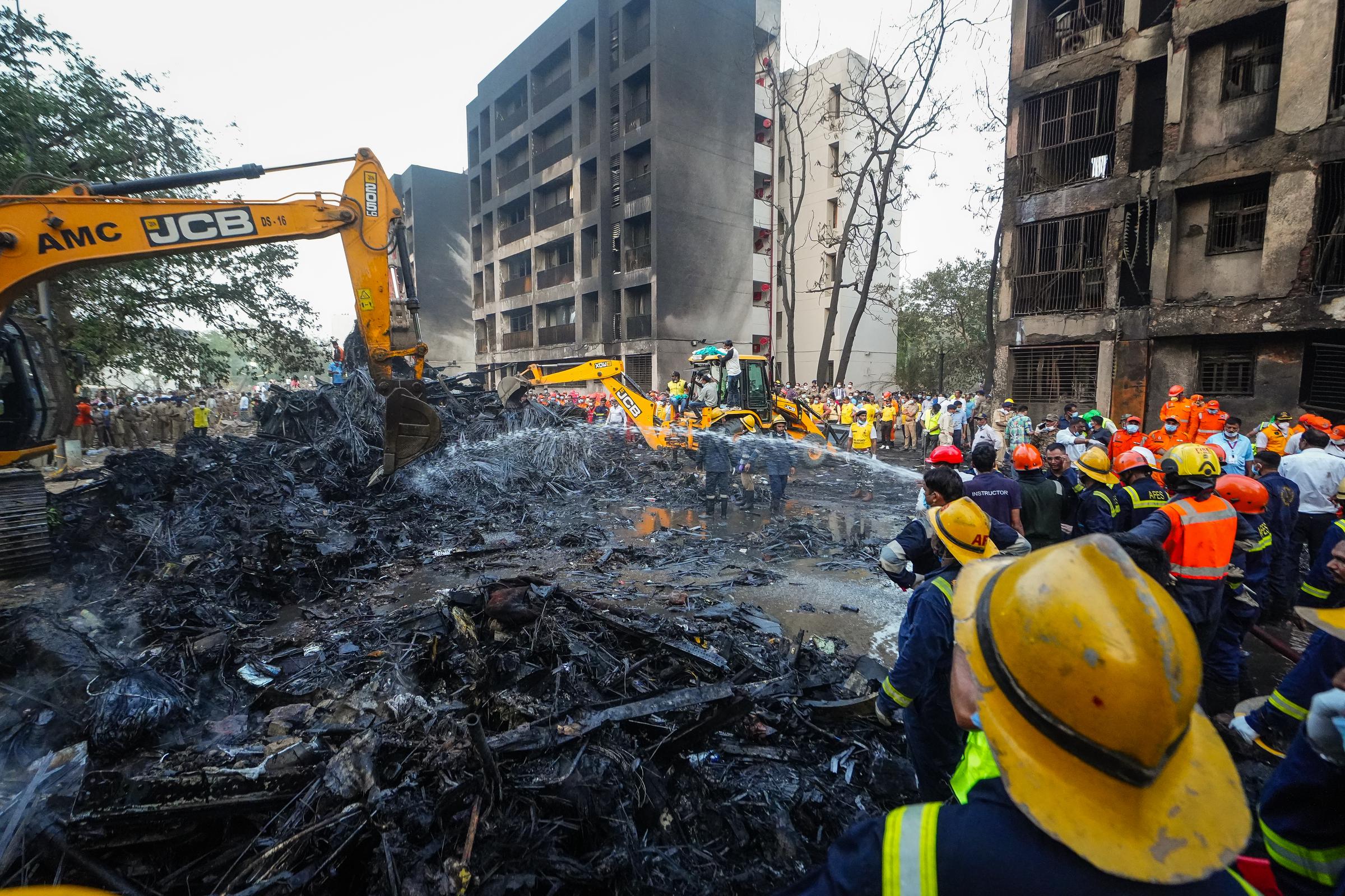 Emergency personnel work at the site where a plane crashed shortly after takeoff from Sardar Vallabhbhai Patel International Airport on June 12, 2025, in Gujarat, India | Source: Getty Images