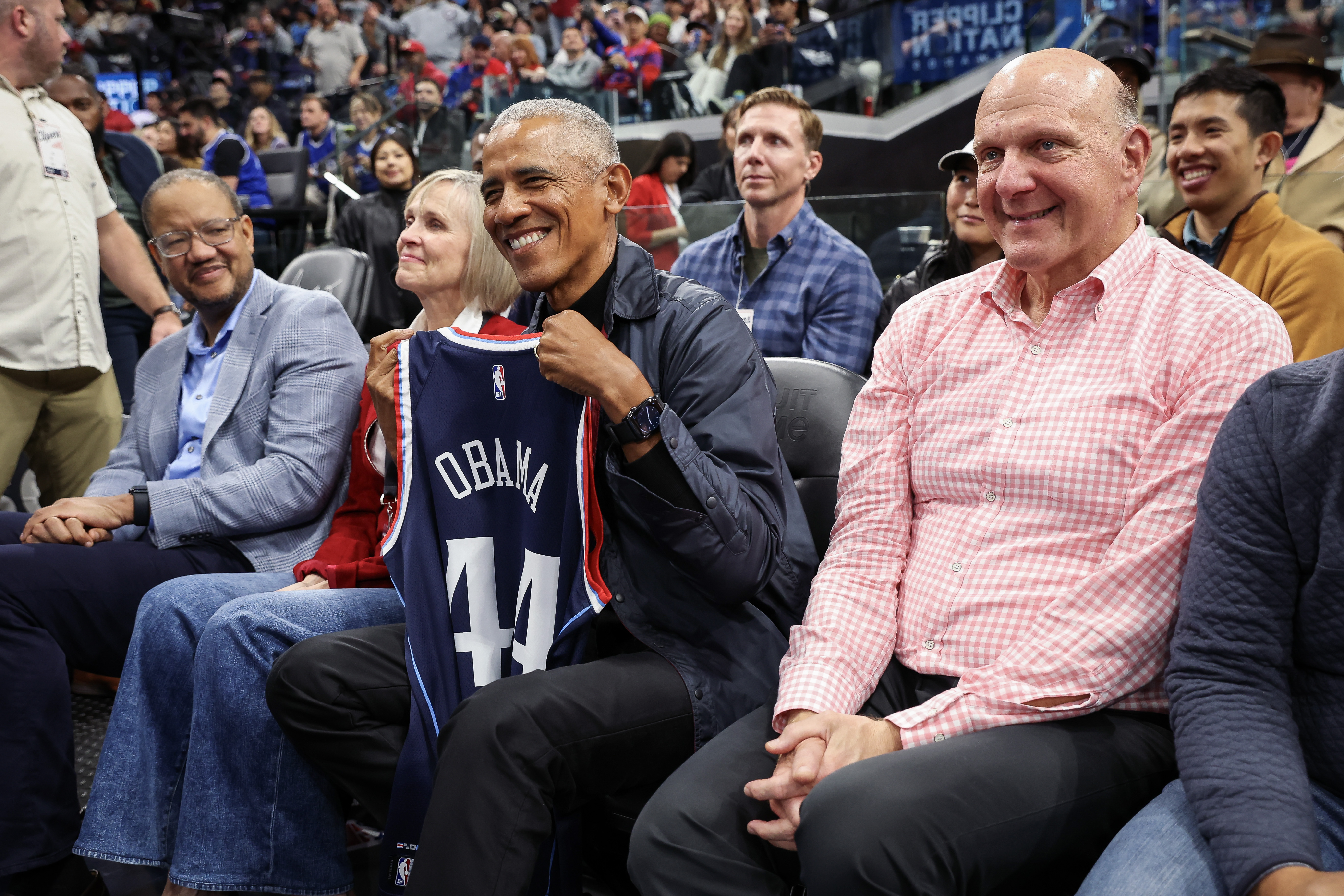 Connie Snyder, Barack Obama, and Steve Ballmer at a basketball game on March 5, 2025, in Inglewood, California. | Source: Getty Images