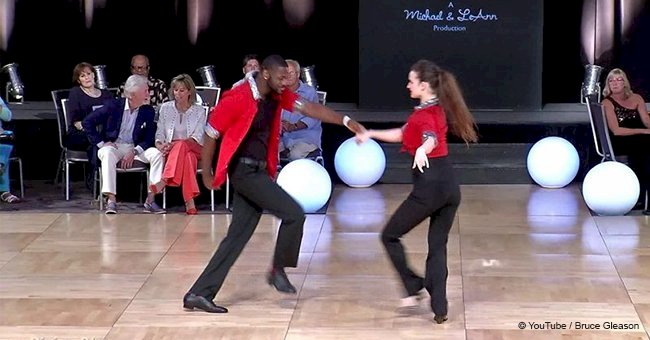 Couple earns a standing ovation from the crowd for their incredible swing dancing