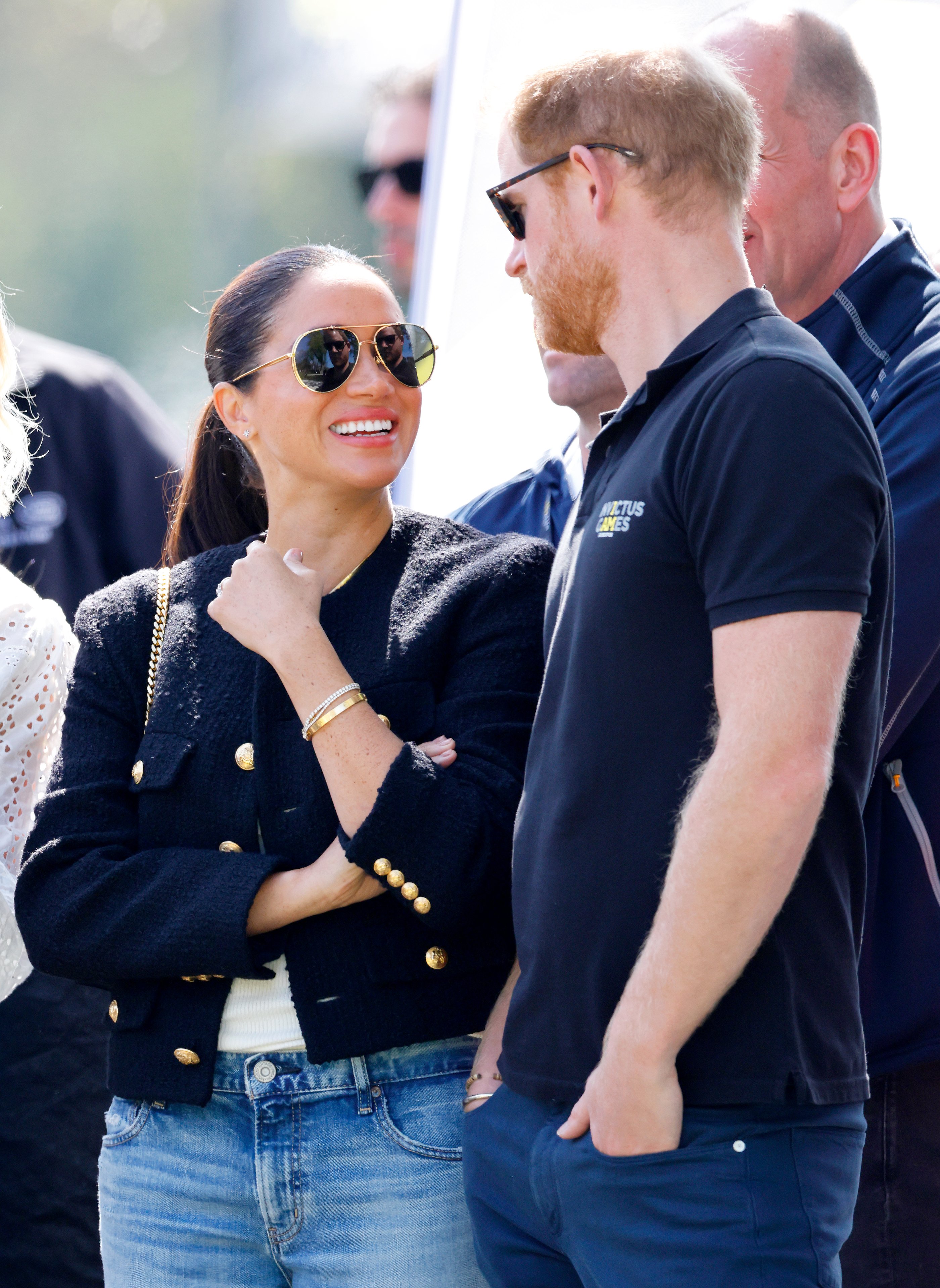 Meghan Markle and Prince Harry watch the Land Rover Driving Challenge, on day 1 of the Invictus Games 2020 at Zuiderpark on April 16, 2022 in The Hague, Netherlands ┃Source: Getty Images