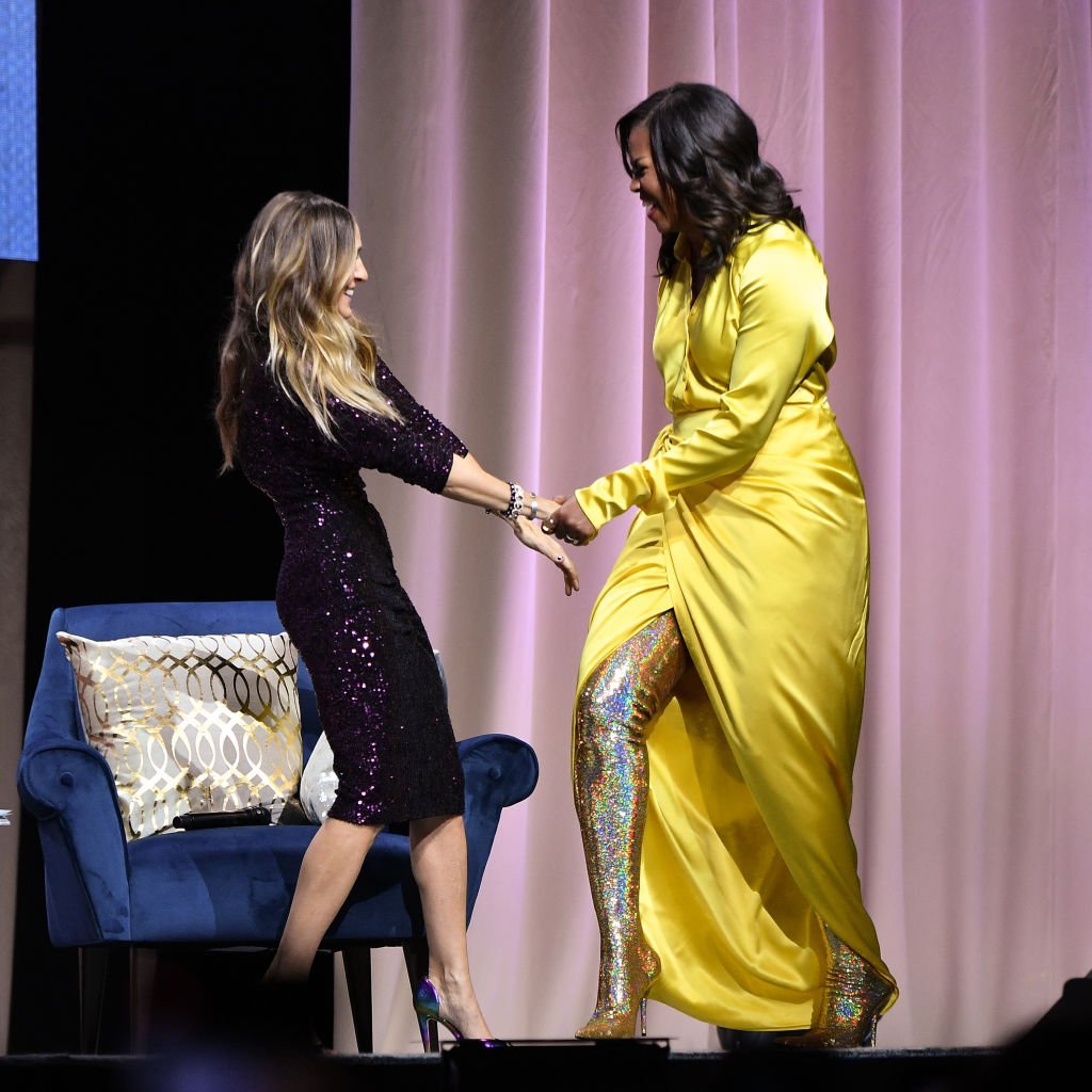 Michelle Obama and Sarah Jessica Parker at Barclays Center on December 19, 2018. | Photo: GettyImages