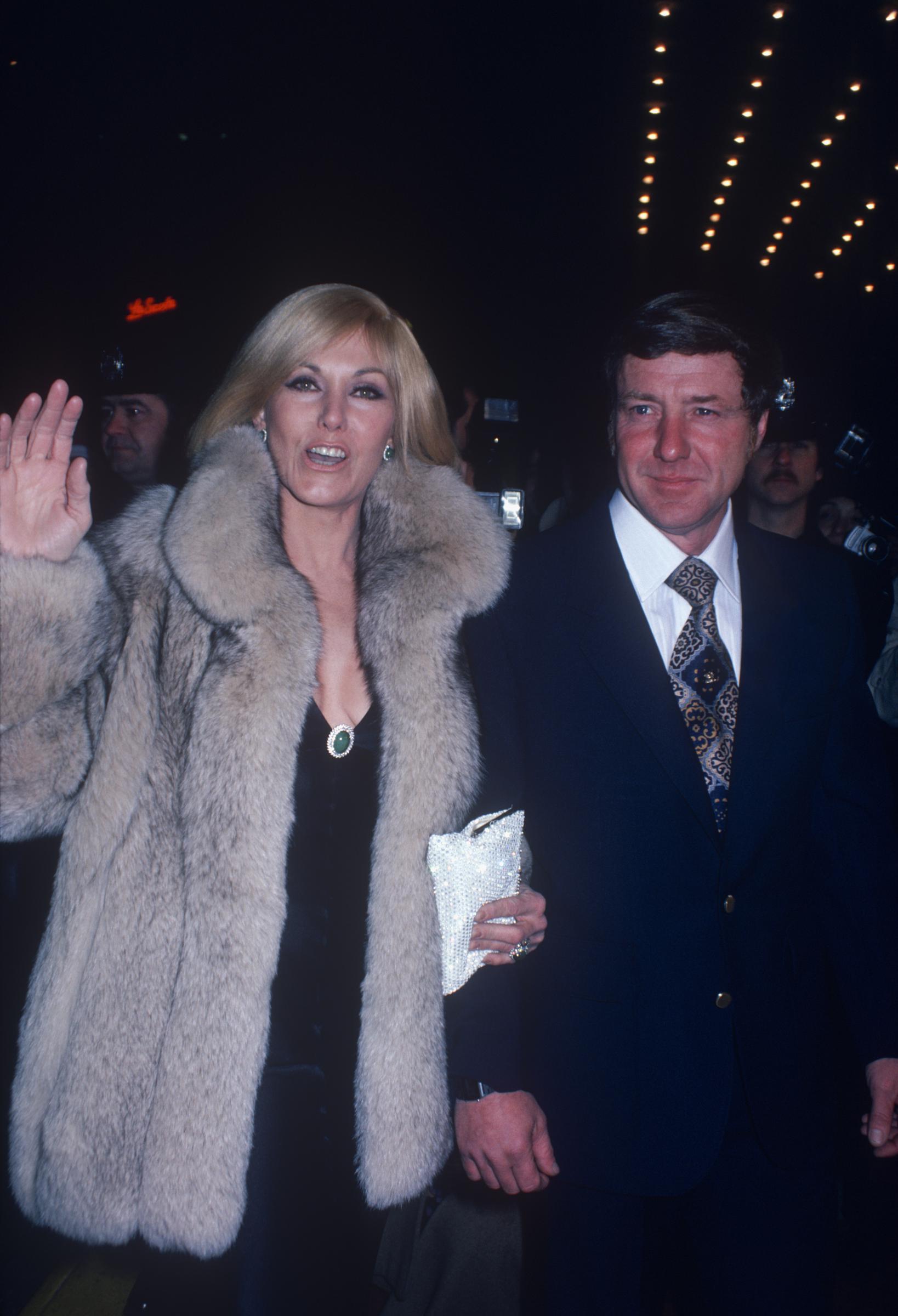 The famous actress and her husband, Robert Malloy, at the premiere party for "The Mirror Crack'd" at the Waldorf Hotel in New York on December 15, 1980. | Source: Getty Images