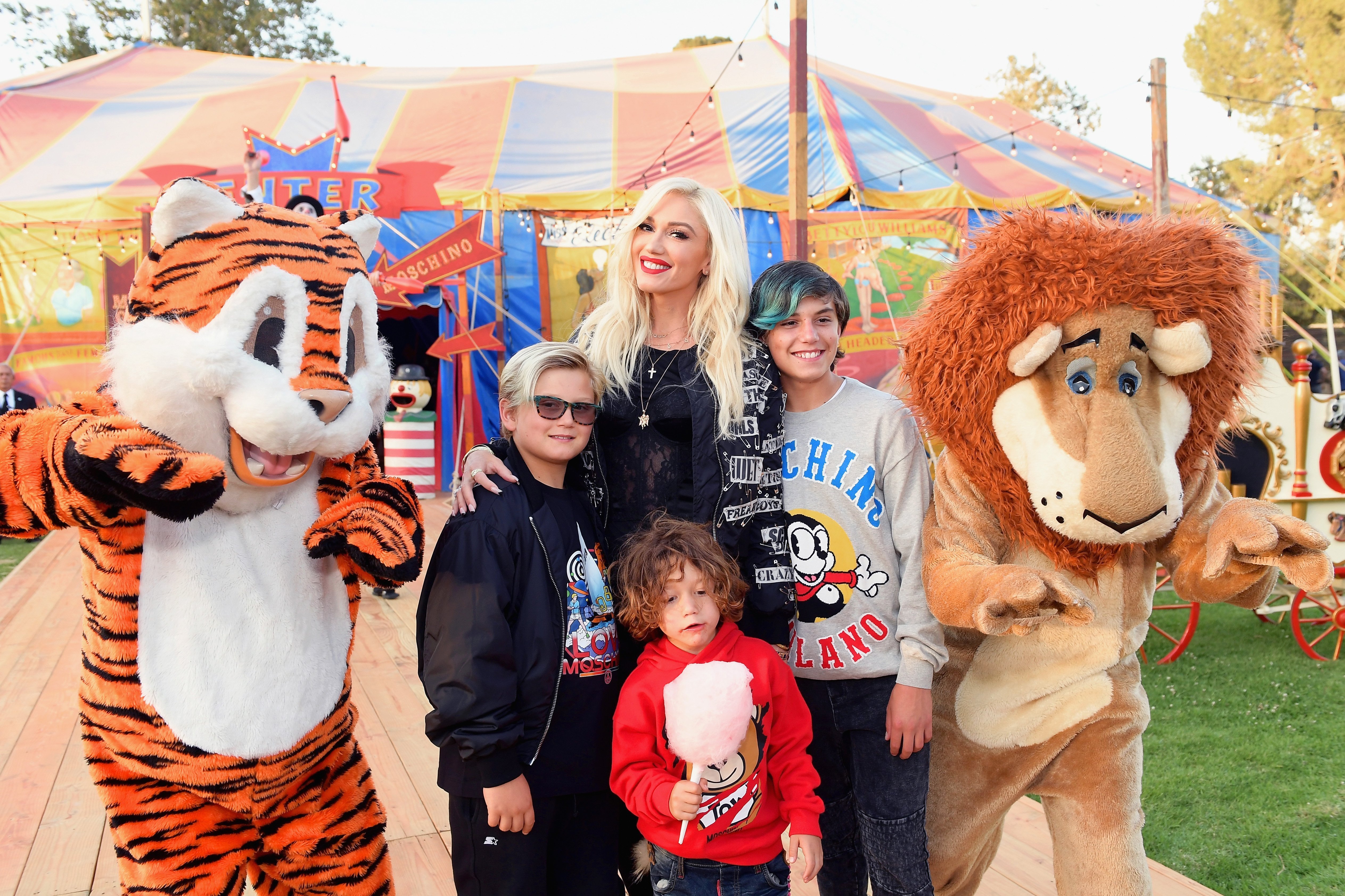 Gwen Stefani with sons Zuma, Apollo, and Kingston Rossdale at the Moschino Spring/Summer 19 Menswear and Women's Resort Collection on June 8, 2018, in Burbank, California | Photo: Matt Winkelmeyer/Getty Images
