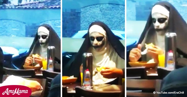 Guy appeared at a restaurant in a scary look imitating a demon from 'The Nun' film