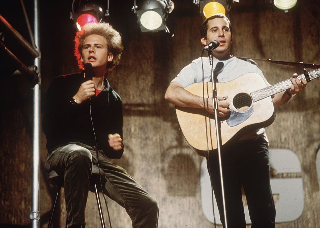 Pop duo Simon and Garfunkel performing on ITV's 'Ready, Steady, Go!', July 8, 1966. | Photo: Getty Images