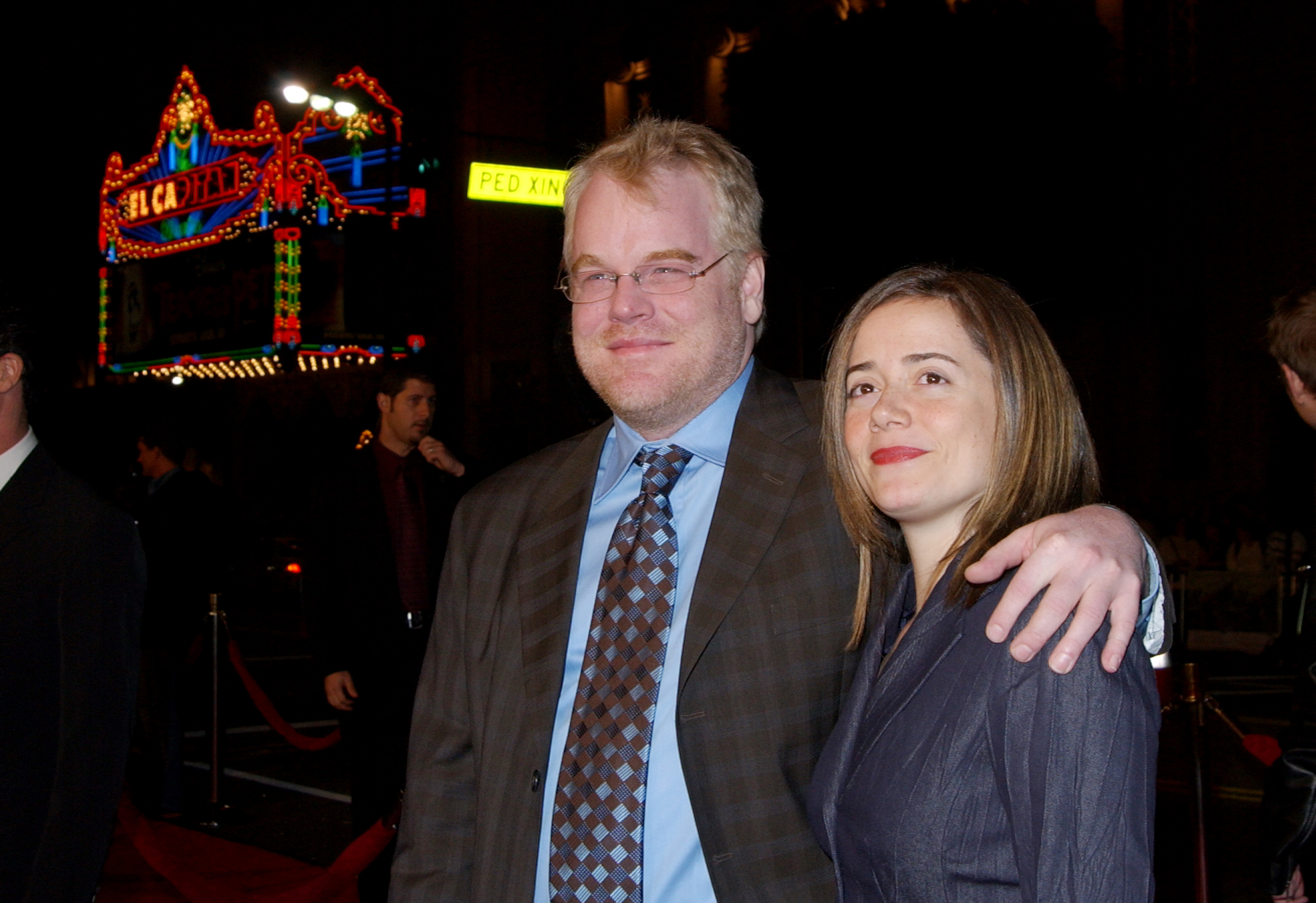 Philip Seymour Hoffman and Mimi O'Donnell during the premiere of "Along Came Polly" at Mann's Chinese Theater in Hollywood, California, on January 12, 2004 | Source: Getty Images