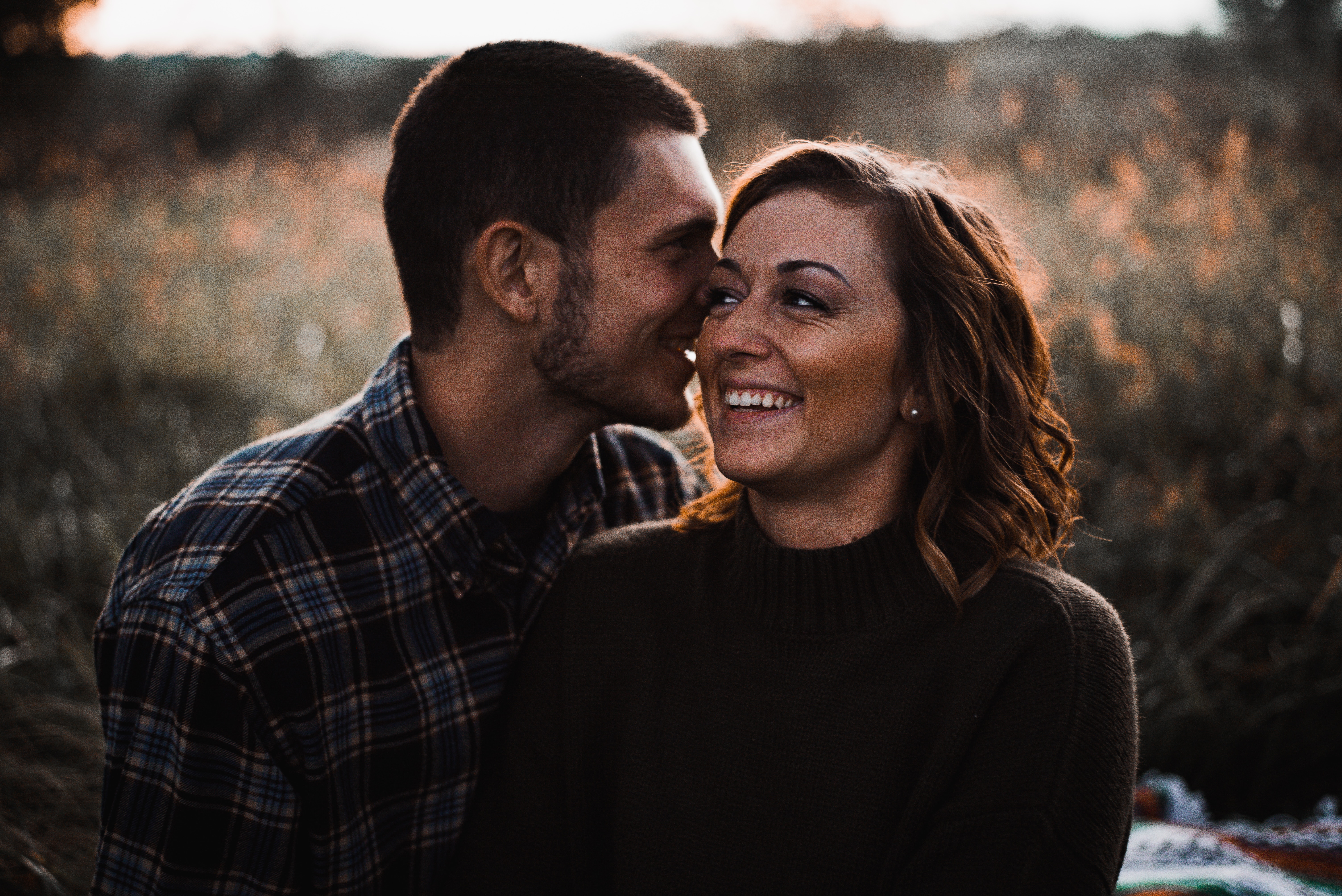 A photo of a couple laughing | Source: Unsplash