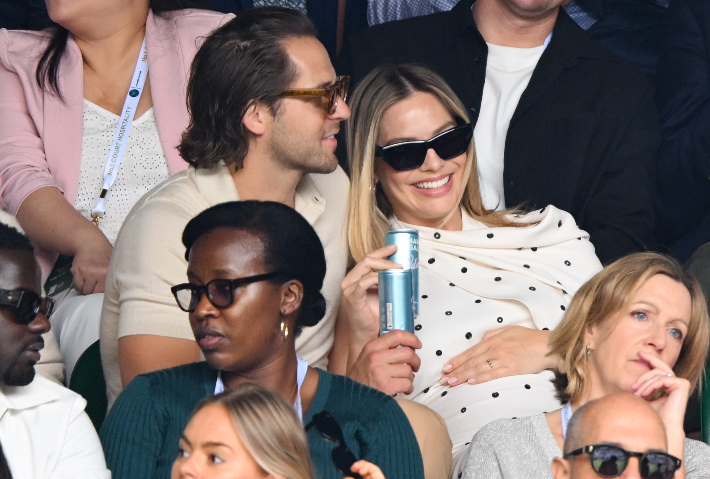 Margot Robbie and Tom Ackerley at the All England Lawn Tennis and Croquet Club on July 12, 2024, in London, England. | Source: Getty Images