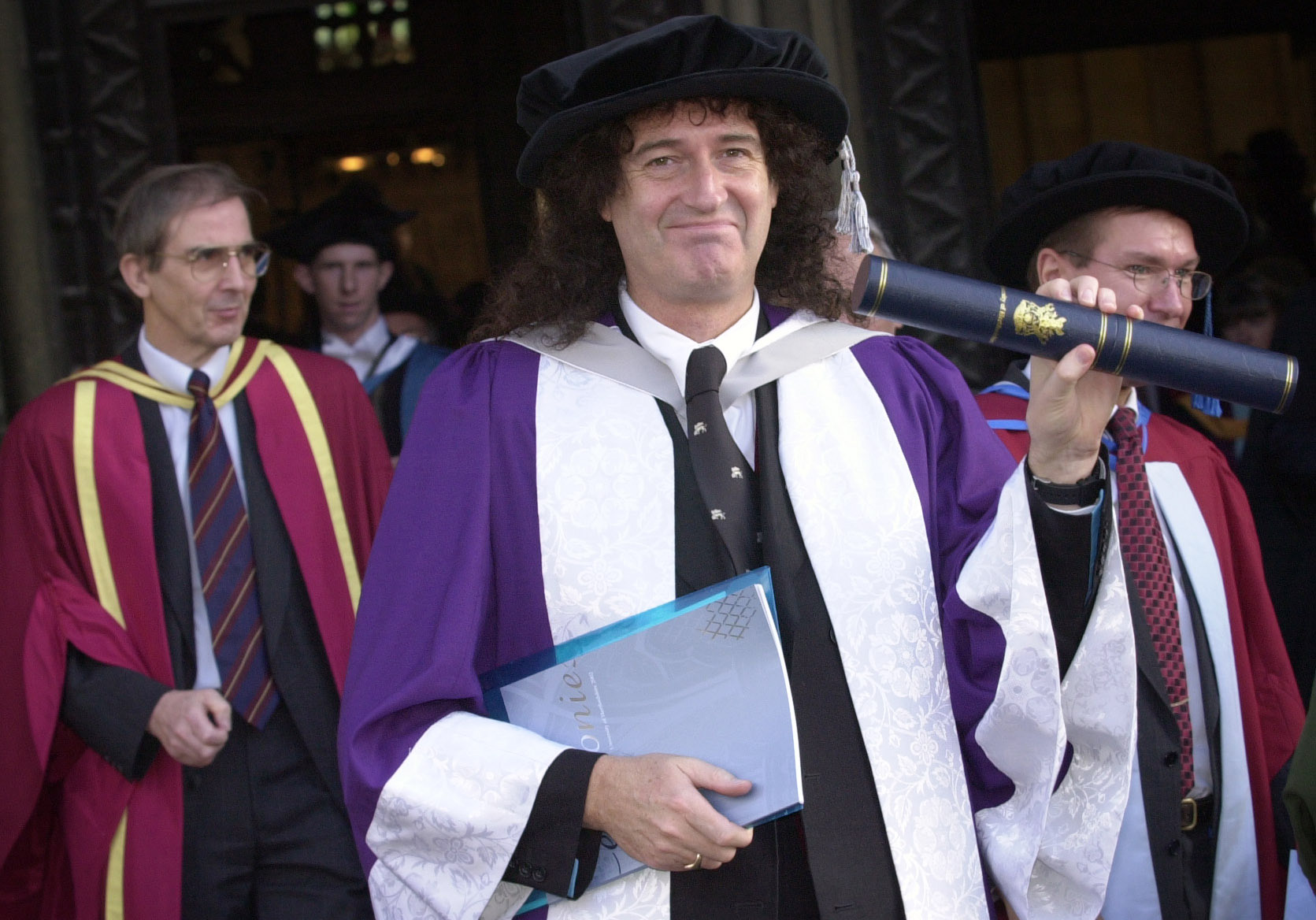 Brian May after he was awarded an honorary Doctorate of Science by the University of Hertfordshire in St Albans, on November 19, 2002. | Source: Getty Images
