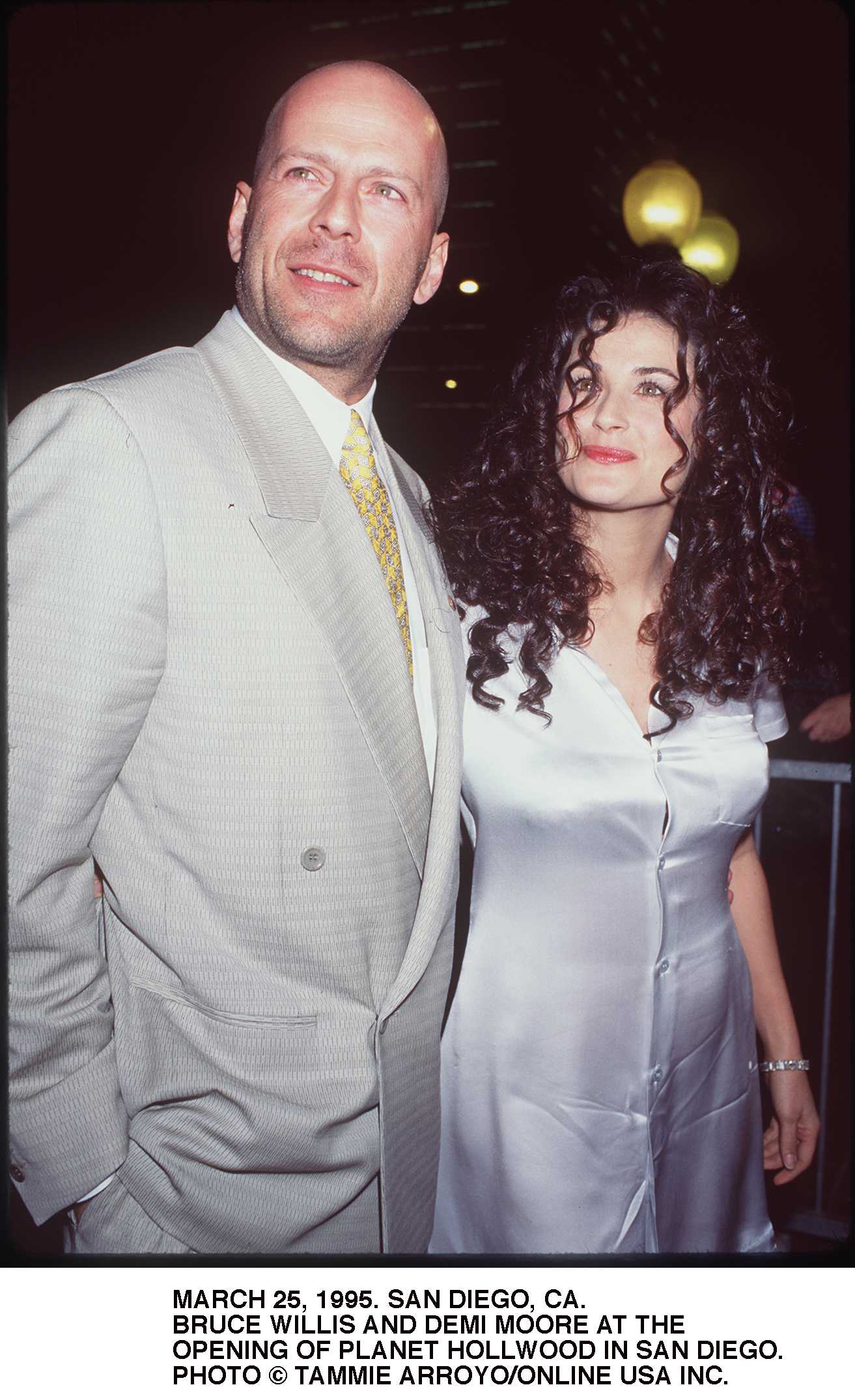 Bruce Willis and Demi Moore at the opening of Planet Hollywood in San Diego, California, on March 25, 1995. | Source: Getty Images