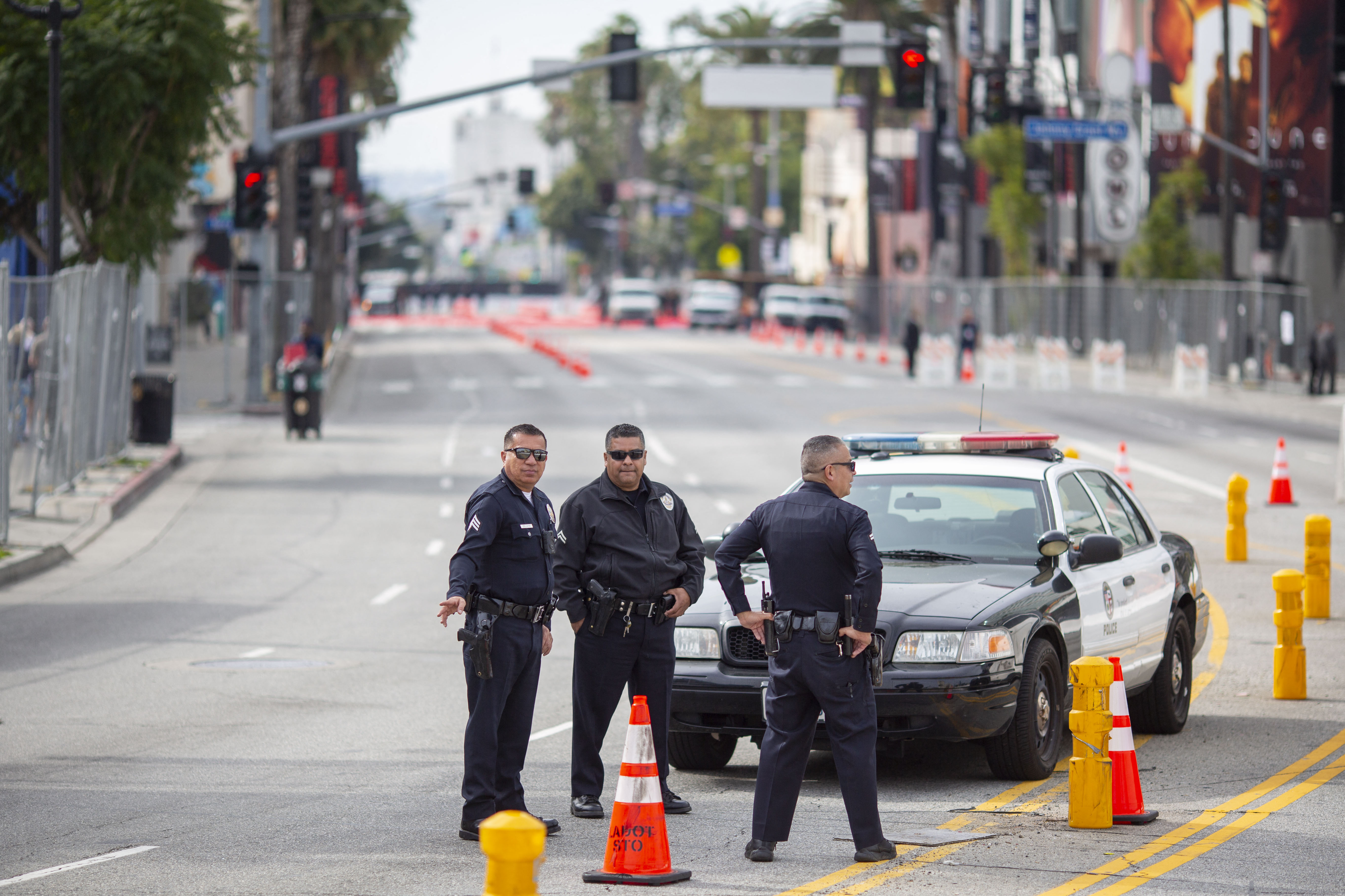 Police officers block a street near the Dolby Theatre ahead of the 96th Annual Academy Awards, in Los Angeles, California, on March 10, 2024 | Source: Getty Images