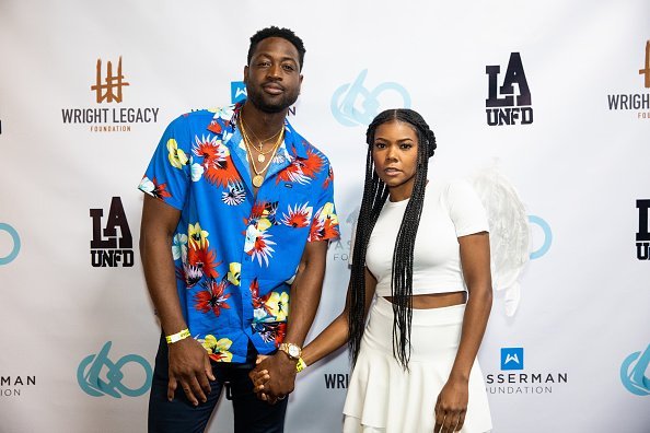 Dwyane Wade and Gabrielle Union pose at the Wright Legacy Foundation skate night at World on Wheels in Los Angeles | Photo: Getty Images