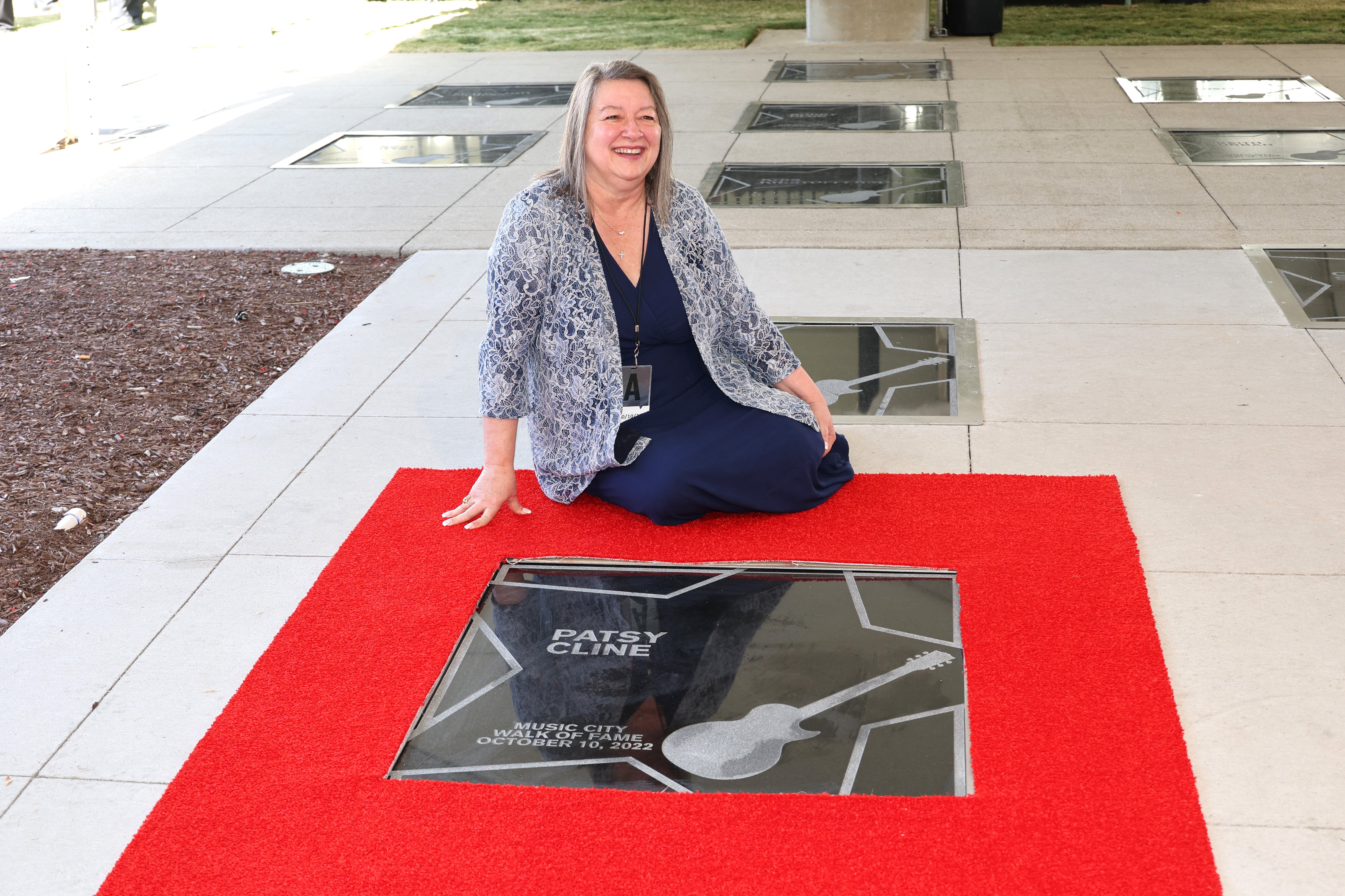 Julie Fudge at the 2022 Music City Walk of Fame Induction Ceremony at Music City Walk of Fame Park in Nashville, Tennessee on October 10, 2022 | Source: Getty Images