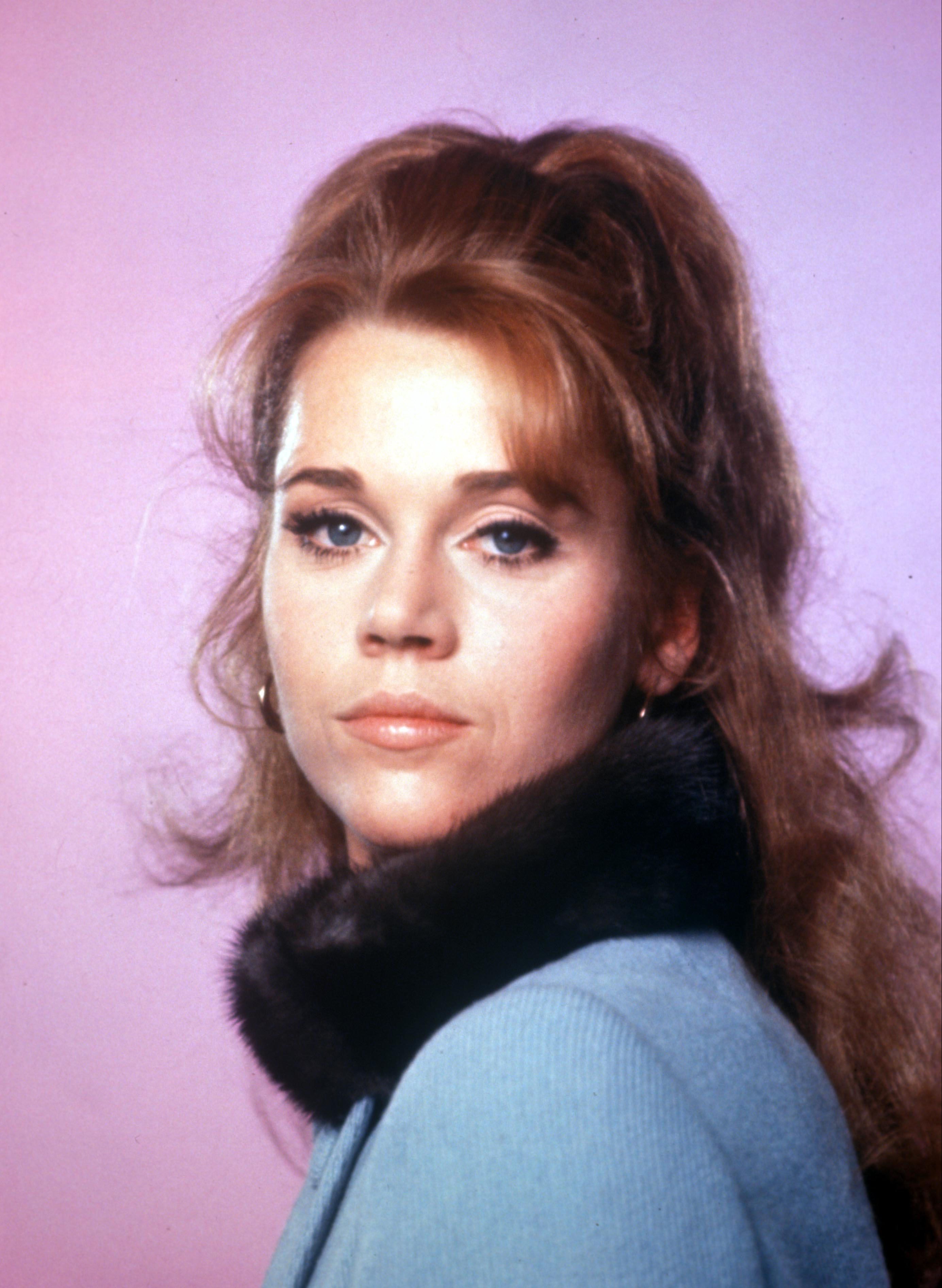 Jane Fonda as a young woman with reddish brown hair in the 60s. | Source: Getty Images