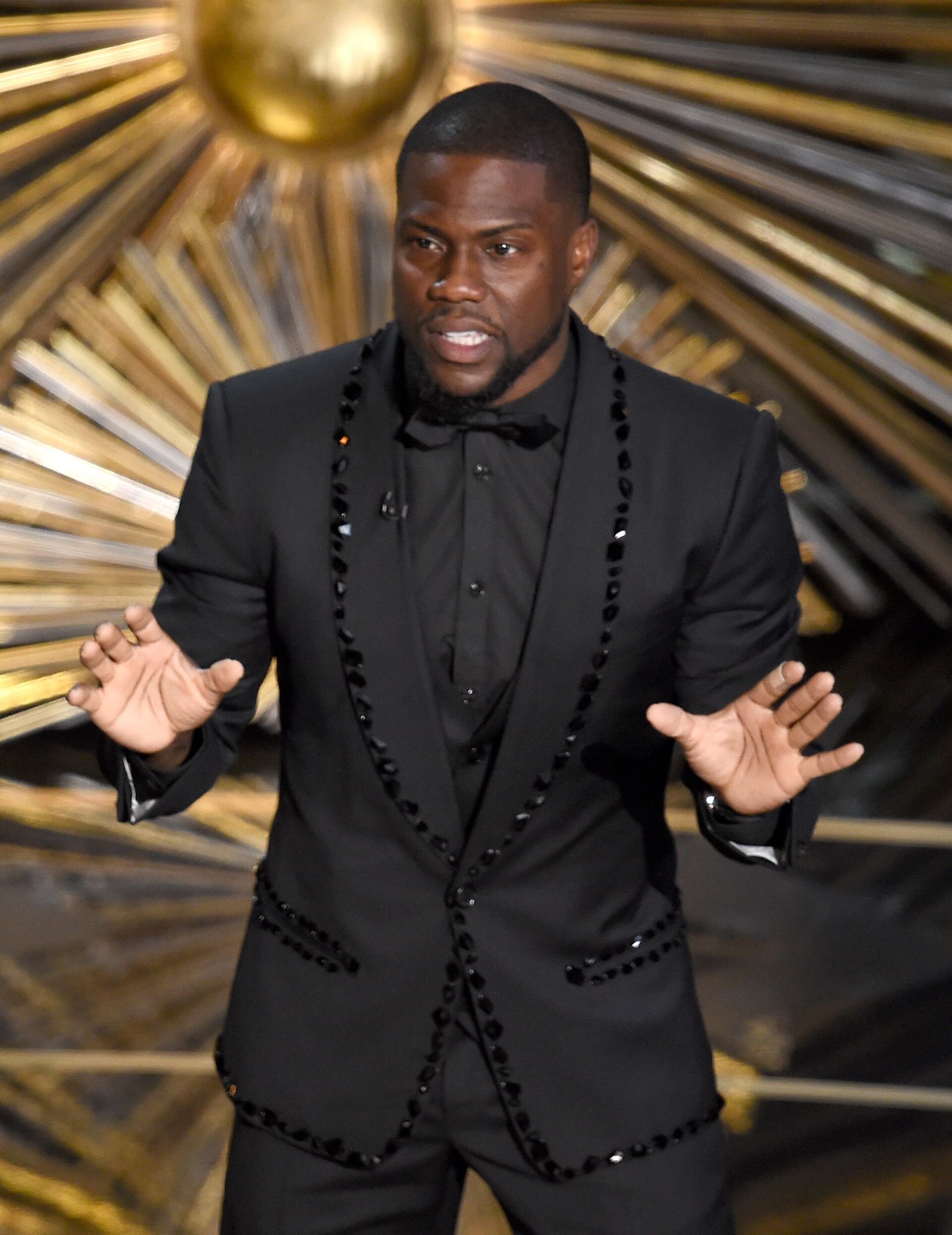 Kevin Hart hosting an awards night onstage | Source: Getty Images/GlobalImagesUkraine