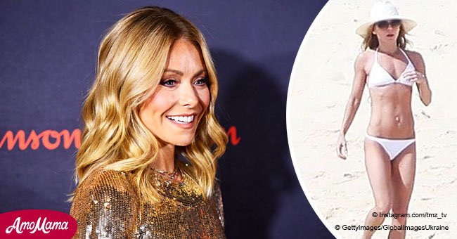 Kelly Ripa flaunts her rock-hard abs in a racy bikini as she enjoys a beach getaway with husband