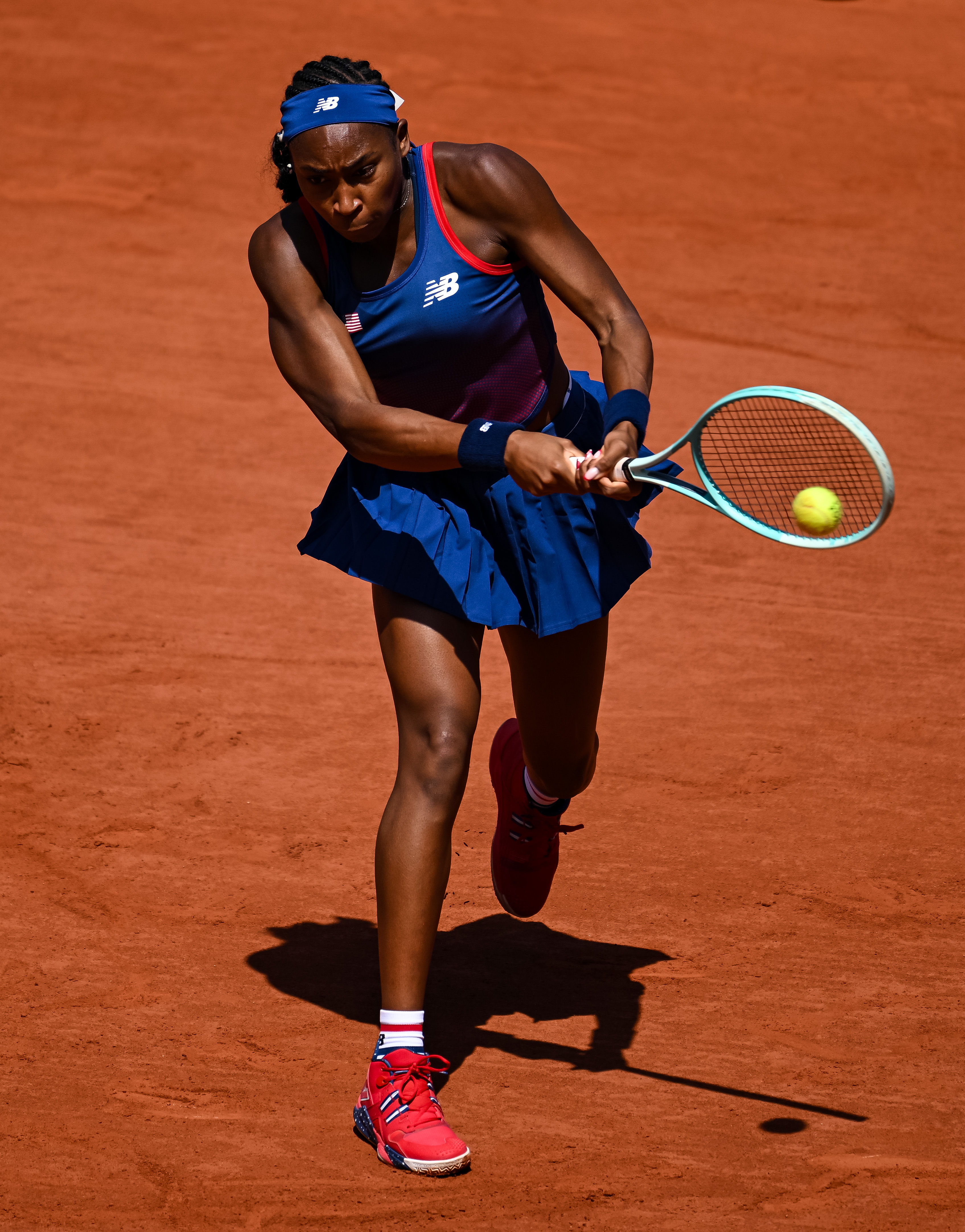 Coco Gauff facing off against Maria Lourdes Carle of Argentina in the Women's Singles second round match in Paris, France on July 29, 2024 | Source: Getty Images