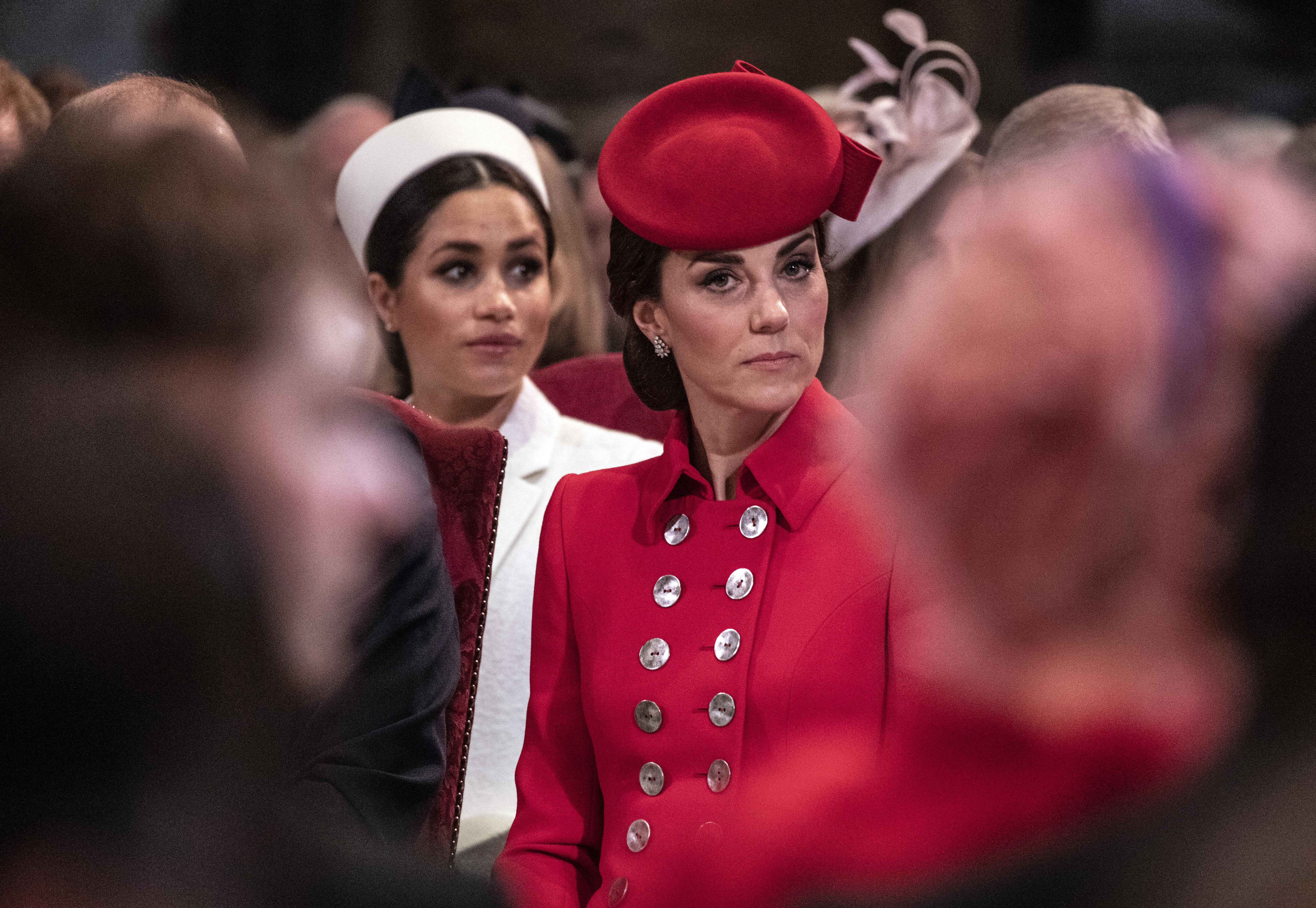 Meghan Markle and Kate Middleton during the Westminster Abbey Commonwealth day service on March 11, 2019 in London, England ┃Source: Getty Images