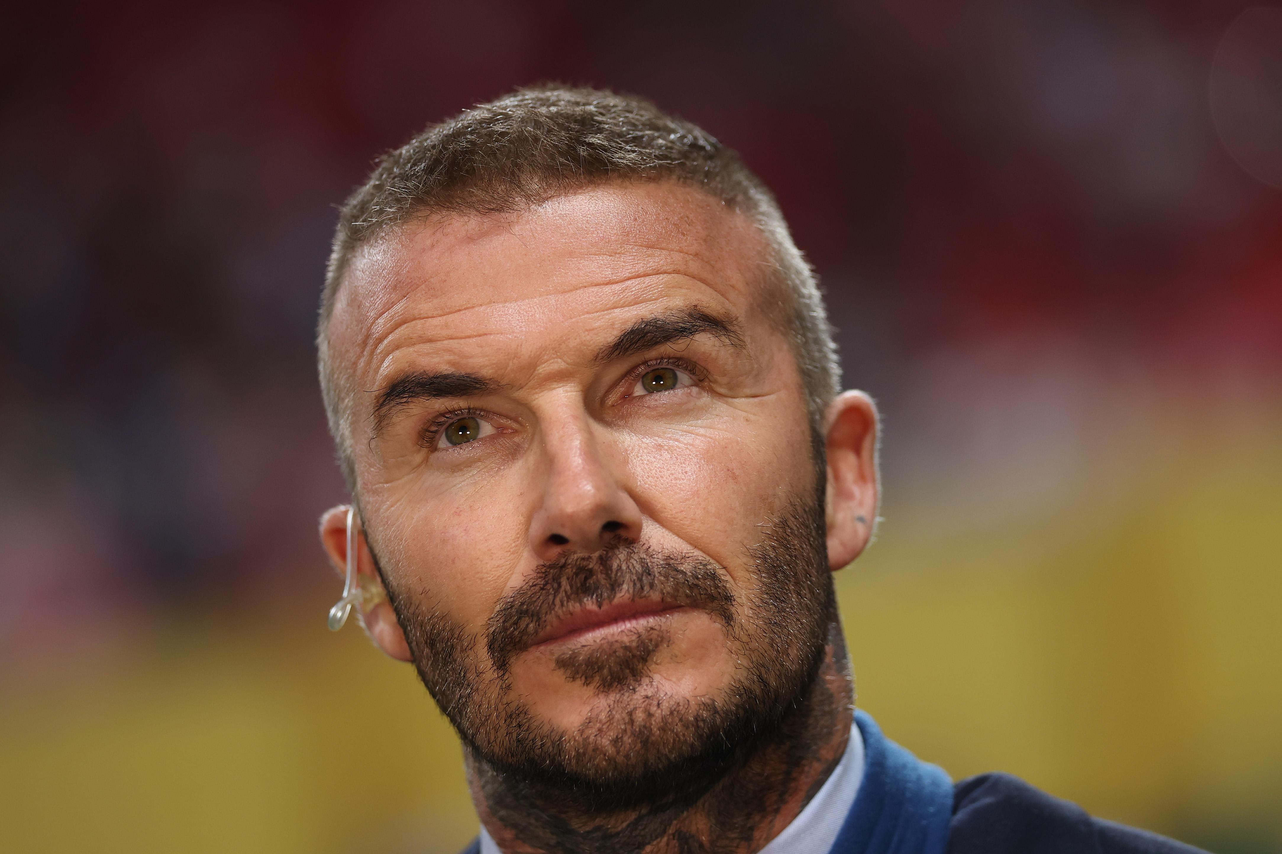 On June 29, 2025, David Beckham looks focused ahead of Inter Miami’s FIFA Club World Cup match in Atlanta. He sports a clean fade, sharp beard, and navy blazer during his pre-match media duties.