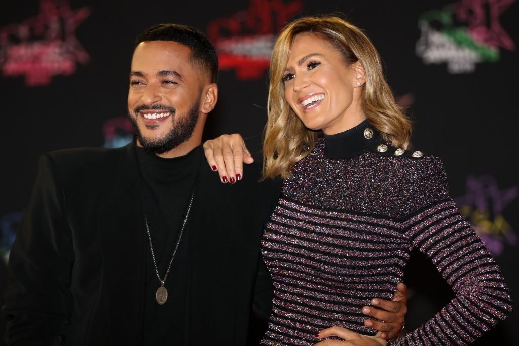 Slimane Nebchi et Vitaa posent sur le tapis rouge alors qu'ils arrivent pour assister à la 21e cérémonie des NRJ Music Awards au Palais des Festivals de Cannes, dans le sud-est de la France, le 9 novembre 2019. | Photo : Getty Images