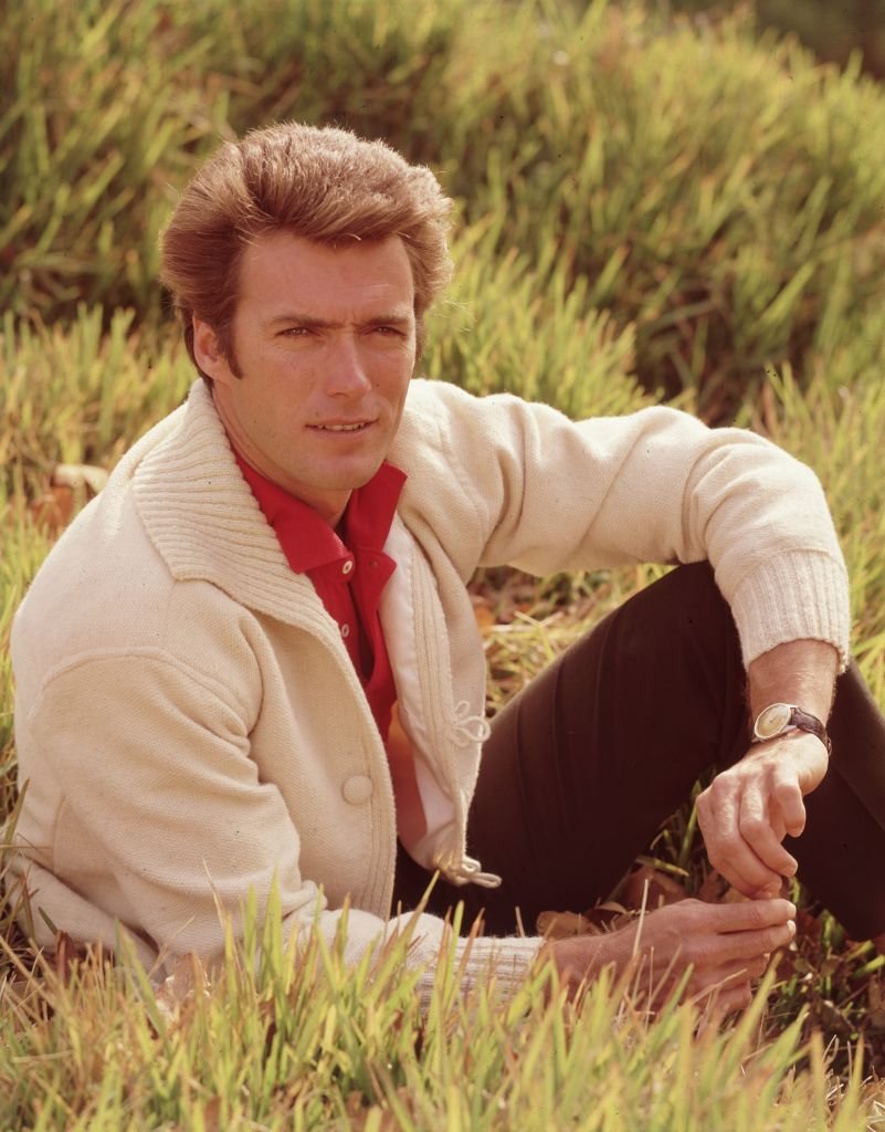 Portrait of Clint Eastwood sitting on a field in 1960. | Source: Getty Images