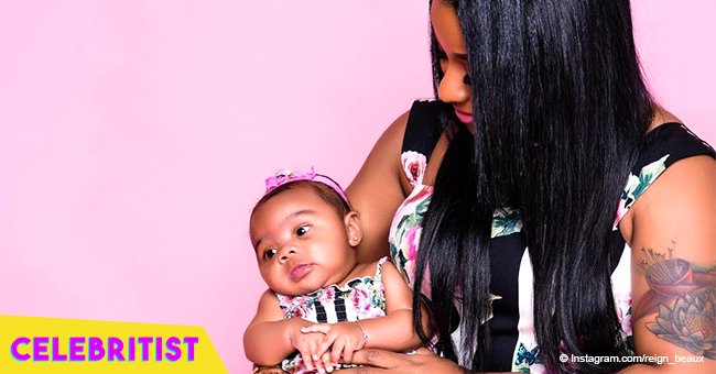 Toya Wright teaches baby Reign to swim while twinning in floral bathing suits in pics