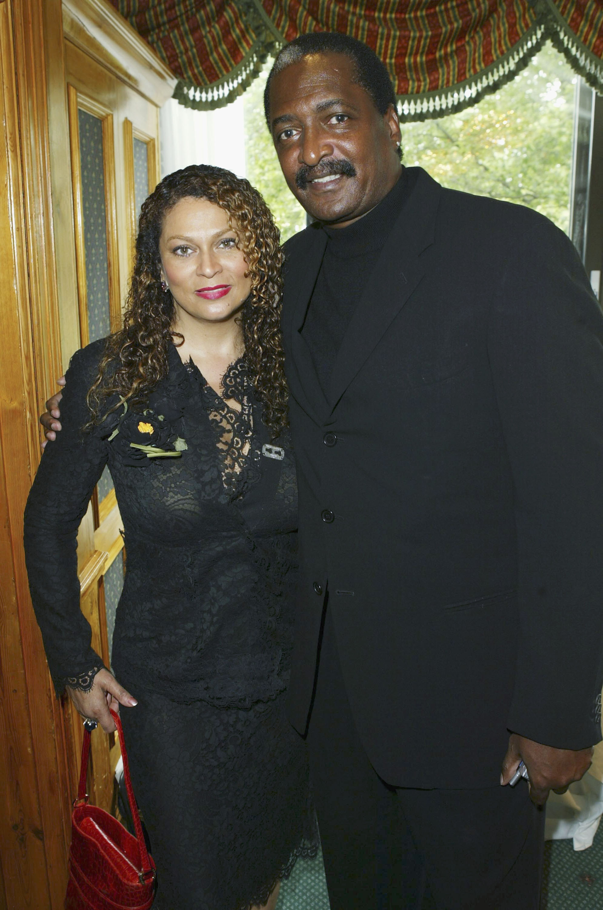 Tina and Matthew Knowles arrive at the Nordoff-Robbins O2 Silver Clef Awards on June 18, 2004 | Source: Getty Images