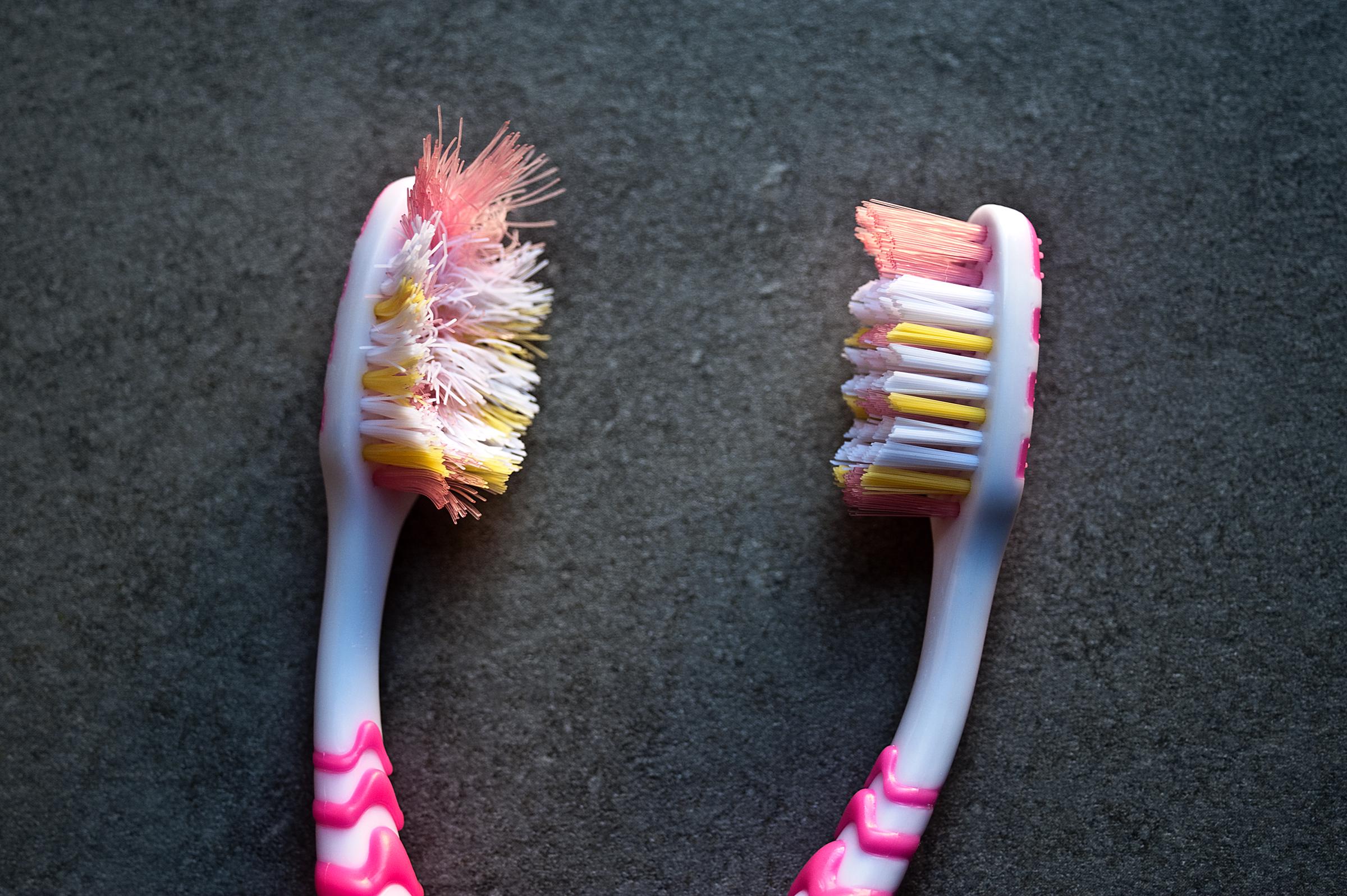 An old toothbrush and a new one | Source: Getty Images