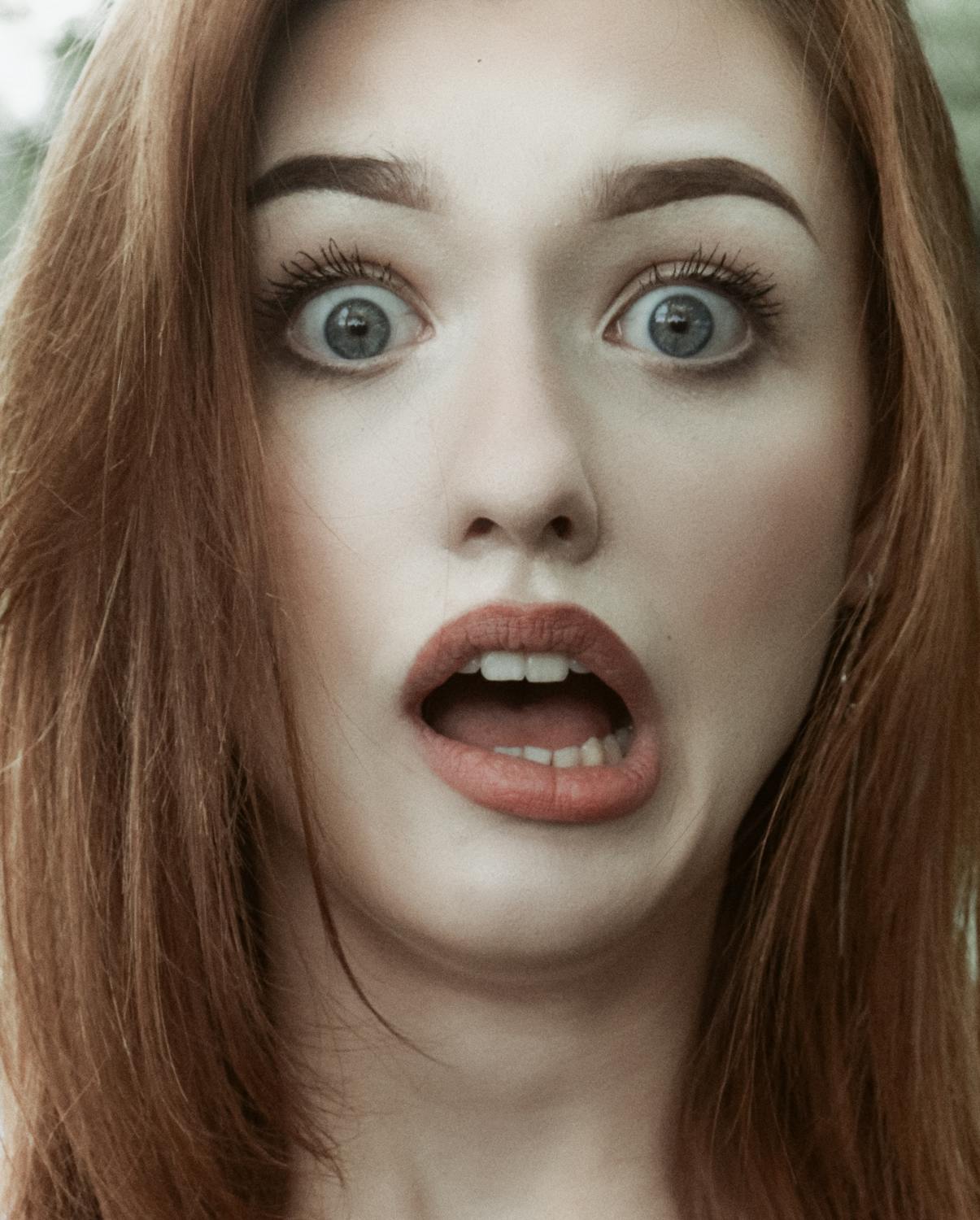 A shocked woman with her mouth open | Source: Pexels