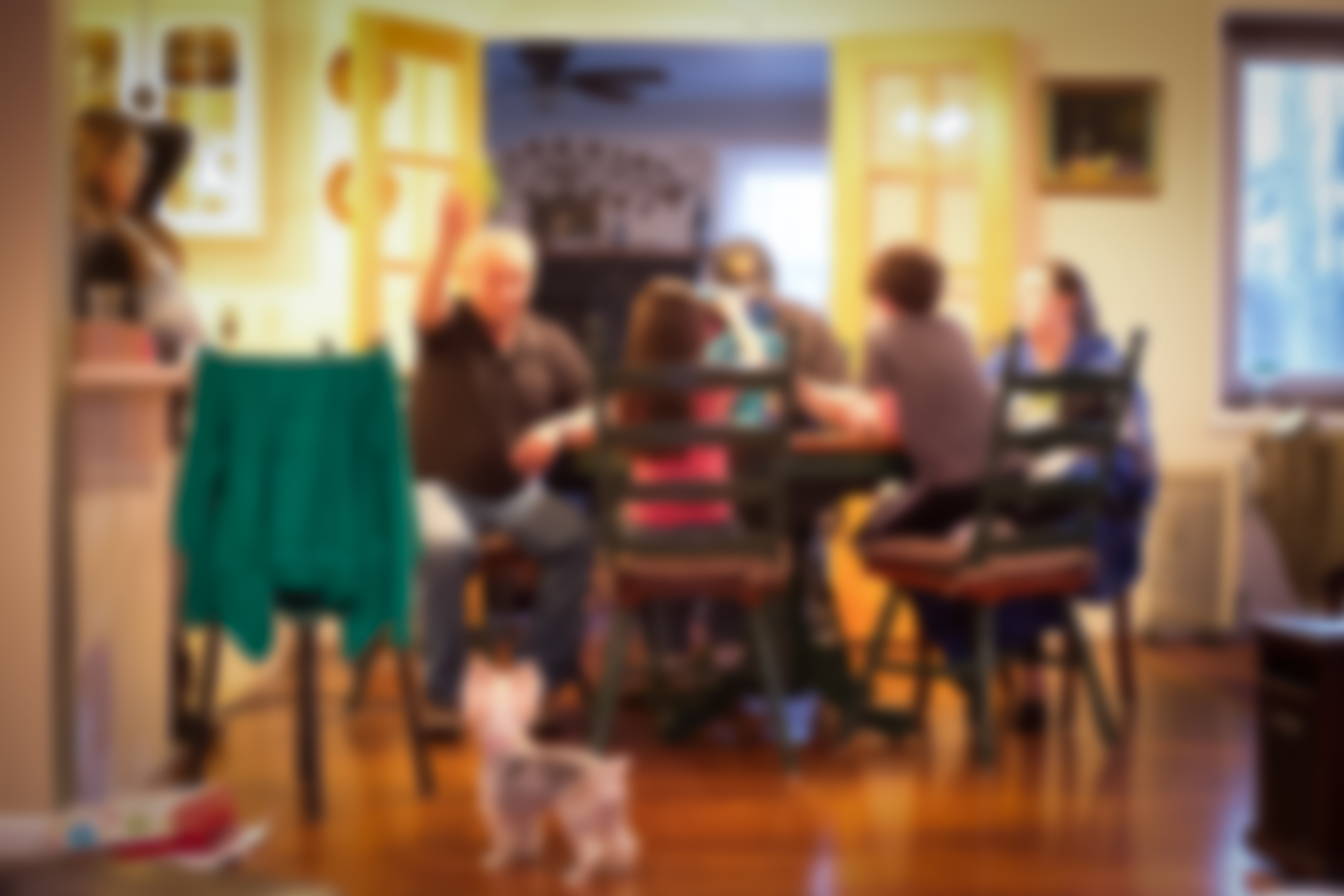 A blurred image of a family dinner | Source: Shutterstock