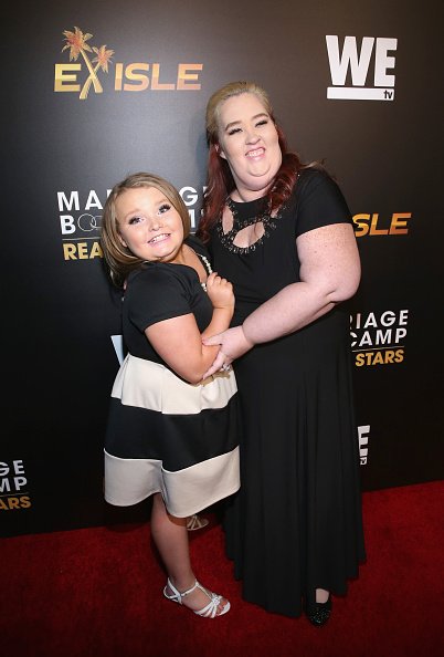 Alana "Honey Boo Boo" Thompson (L) and June "Mama June" Thompson attend the WE tv premiere of "Marriage Boot Camp" Reality Stars and "Ex-isled" on November 19, 2015, in Los Angeles, California. | Source: Getty Images.